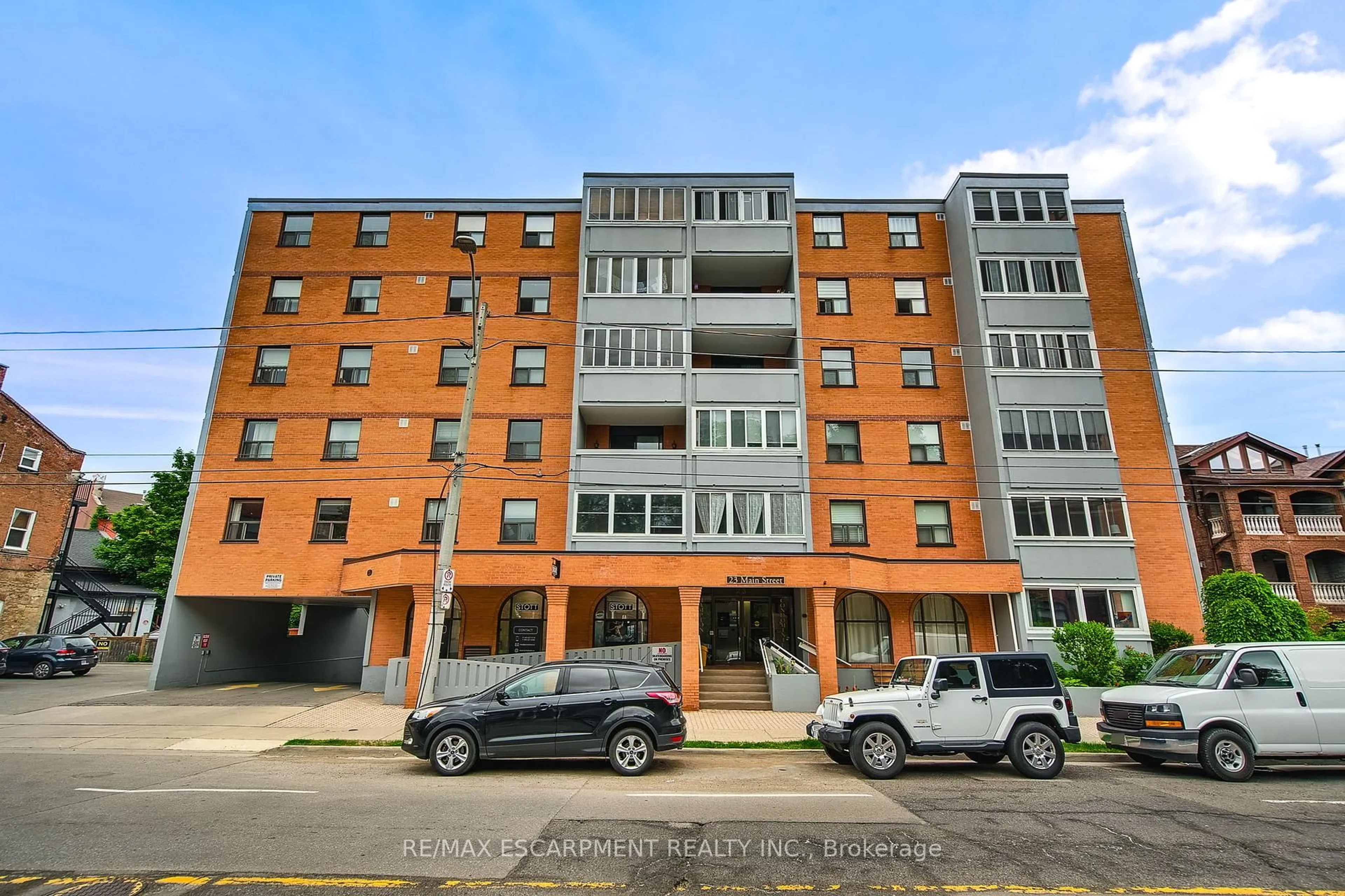 A pic from outside/outdoor area/front of a property/back of a property/a pic from drone, building for 23 Main St #501, Hamilton Ontario L9H 2P7
