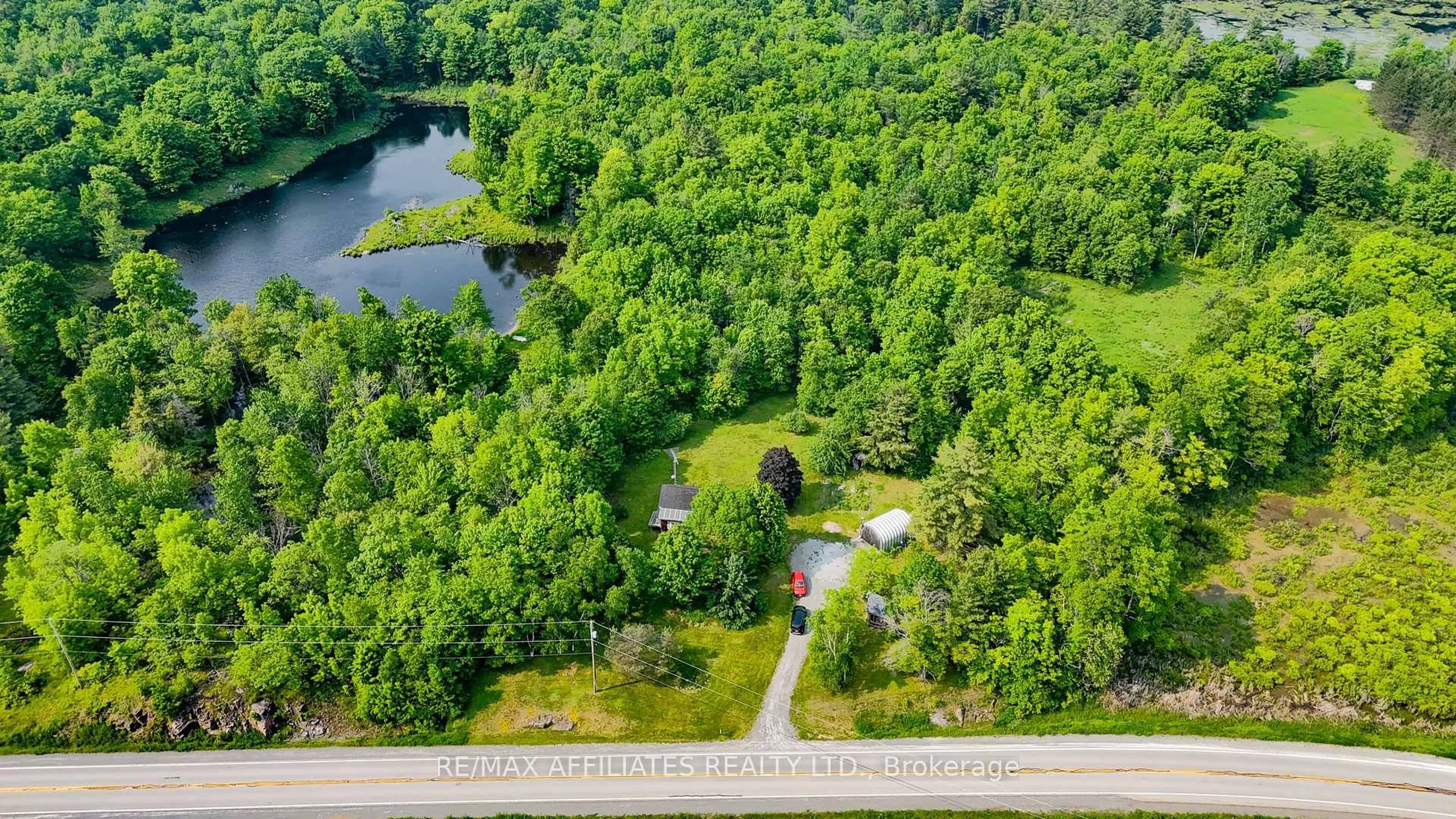 A pic from outside/outdoor area/front of a property/back of a property/a pic from drone, water/lake/river/ocean view for 1500 Mountain Rd, Rideau Lakes Ontario K0G 1X0