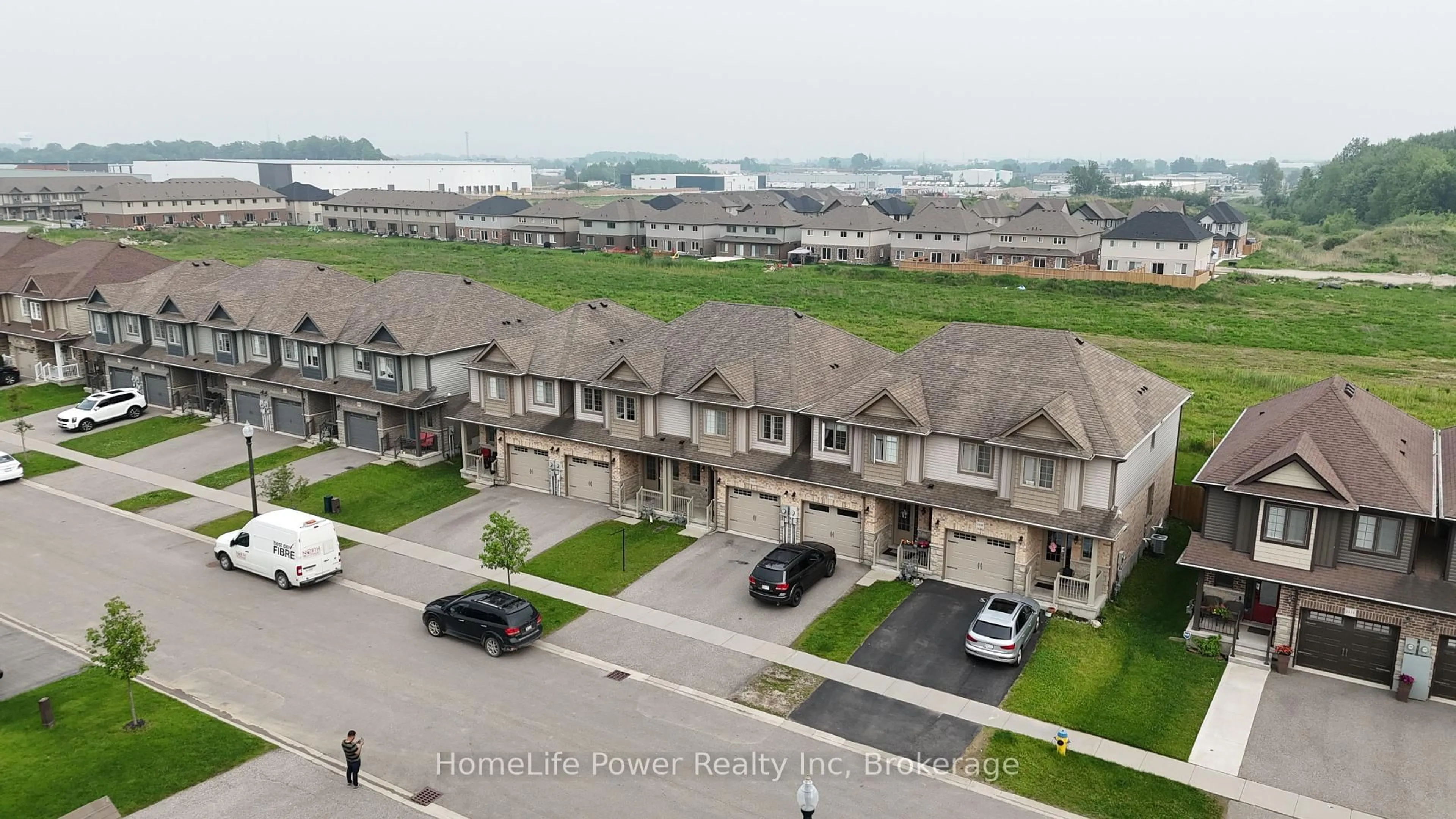 A pic from outside/outdoor area/front of a property/back of a property/a pic from drone, water/lake/river/ocean view for 1426 Caen Ave, Woodstock Ontario N4T 0J7