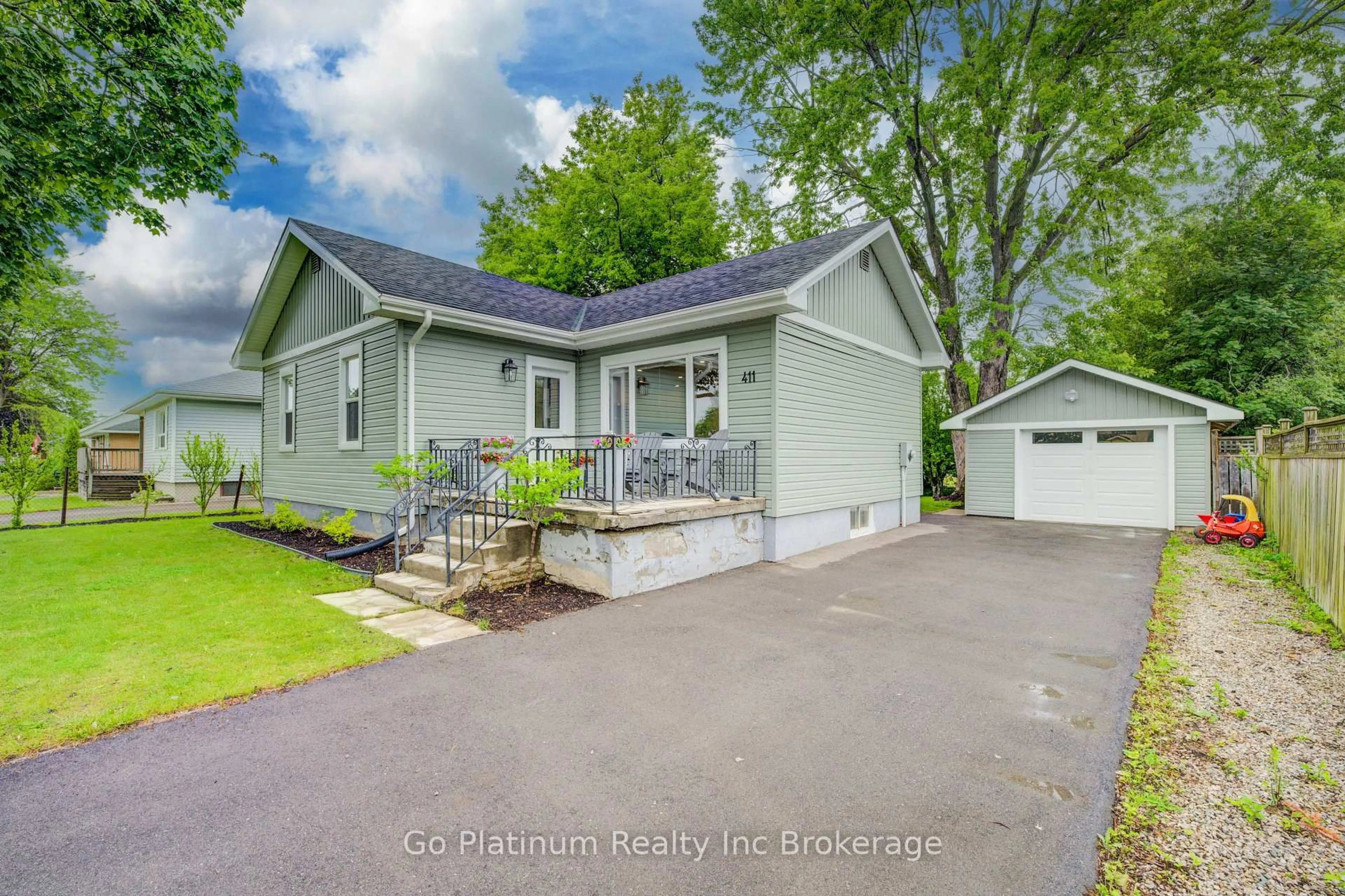 Home with vinyl exterior material, street for 411 Powell St, Woodstock Ontario N4S 3T5