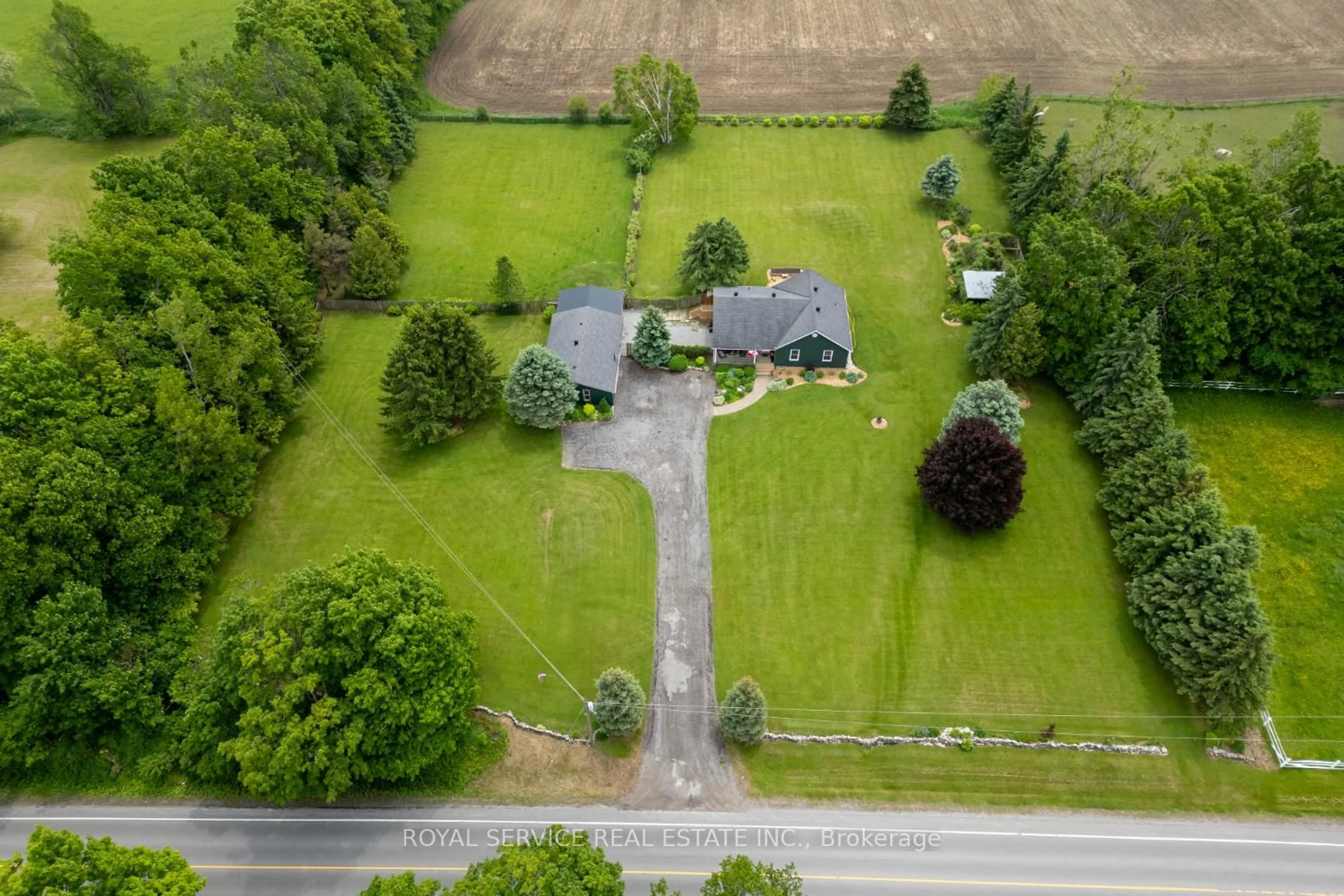 A pic from outside/outdoor area/front of a property/back of a property/a pic from drone, street for 495 County Rd 21 Rd, Cavan Monaghan Ontario L0A 1G0
