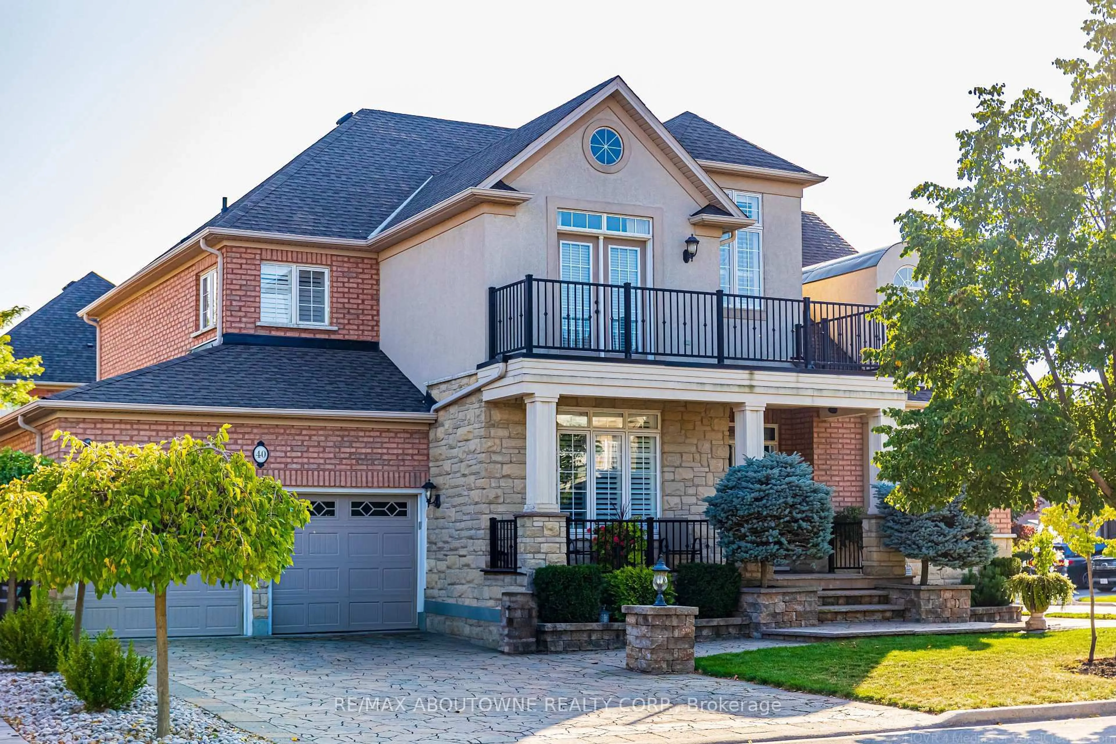 Home with brick exterior material, street for 40 Delrosa Way, Hamilton Ontario L8E 6E5