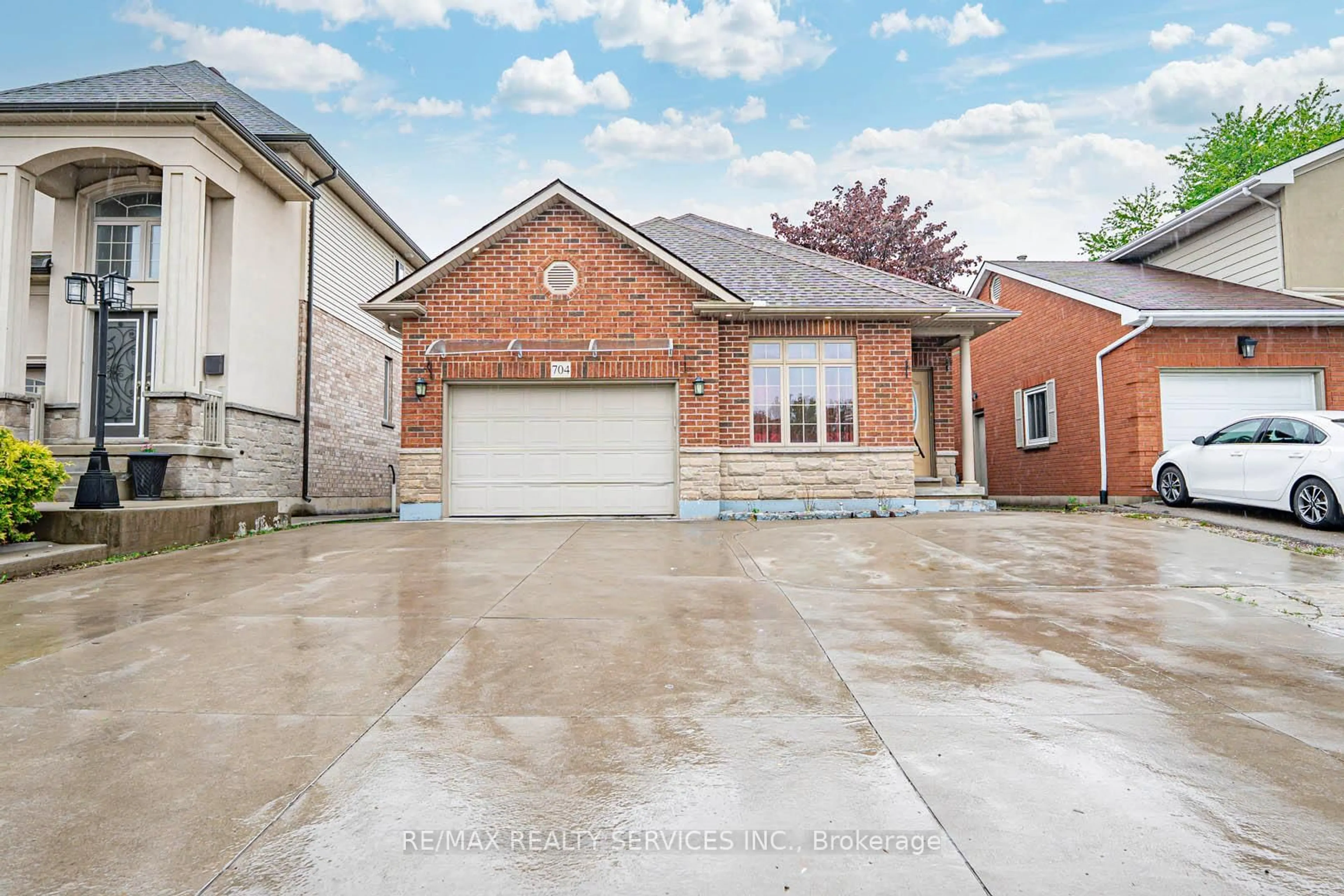 Home with brick exterior material, street for 704 Stone Church Rd, Hamilton Ontario L8W 1A7