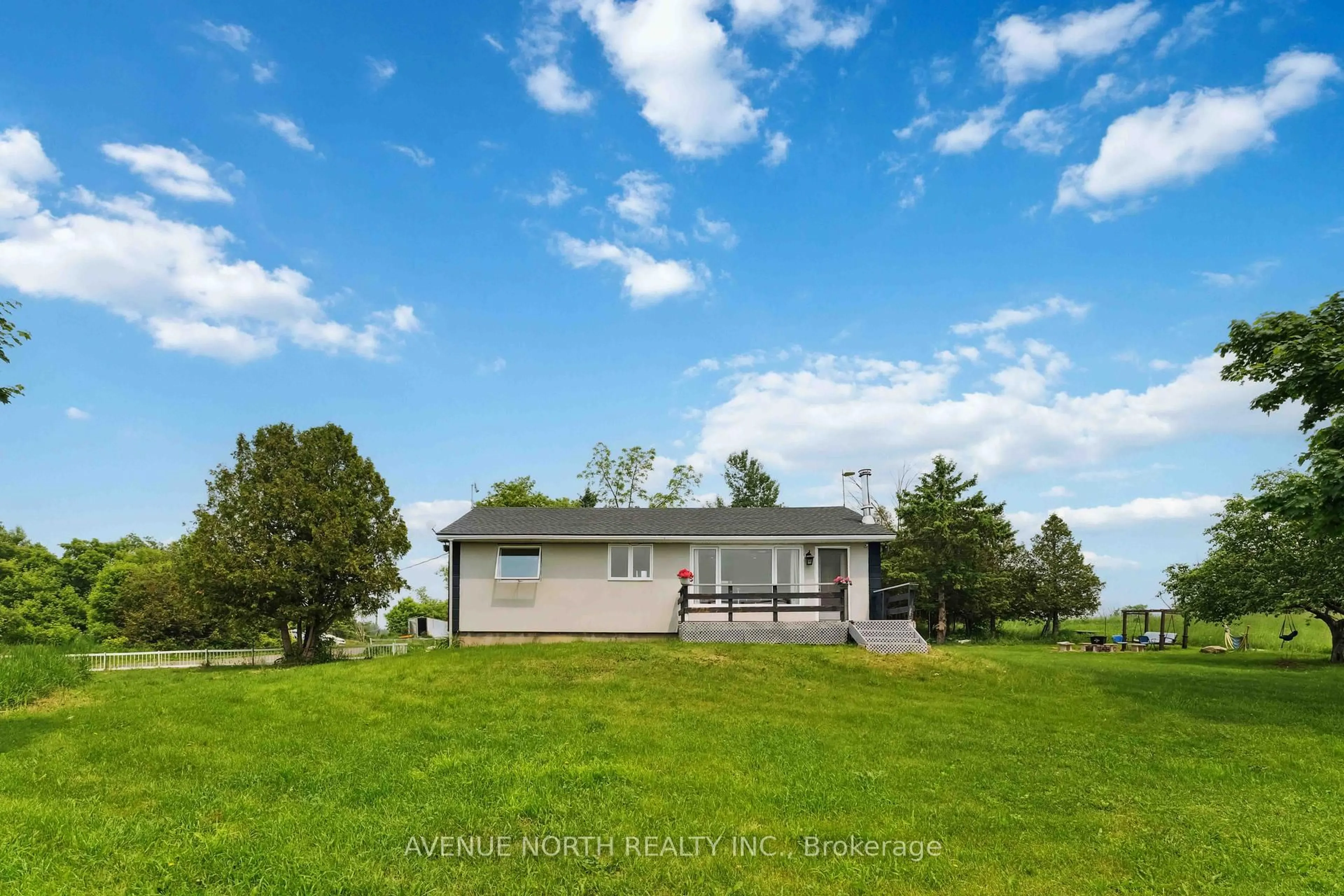A pic from outside/outdoor area/front of a property/back of a property/a pic from drone, water/lake/river/ocean view for 3935 SWALE Rd, Osgoode Ontario K0A 2W0