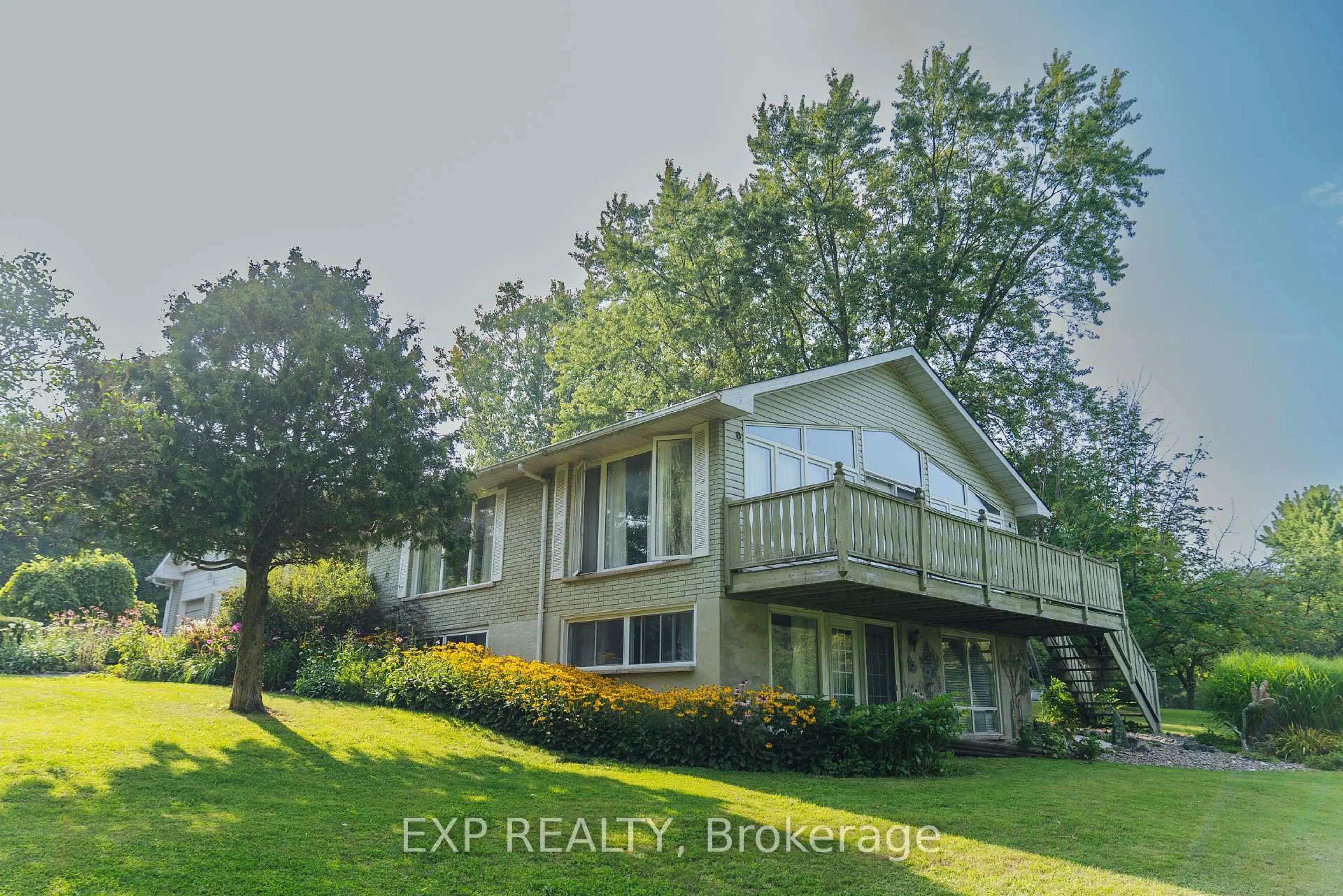 Home with vinyl exterior material, water/lake/river/ocean view for 283 Rainbow Ridge Rd, Kawartha Lakes Ontario K0M 2C0