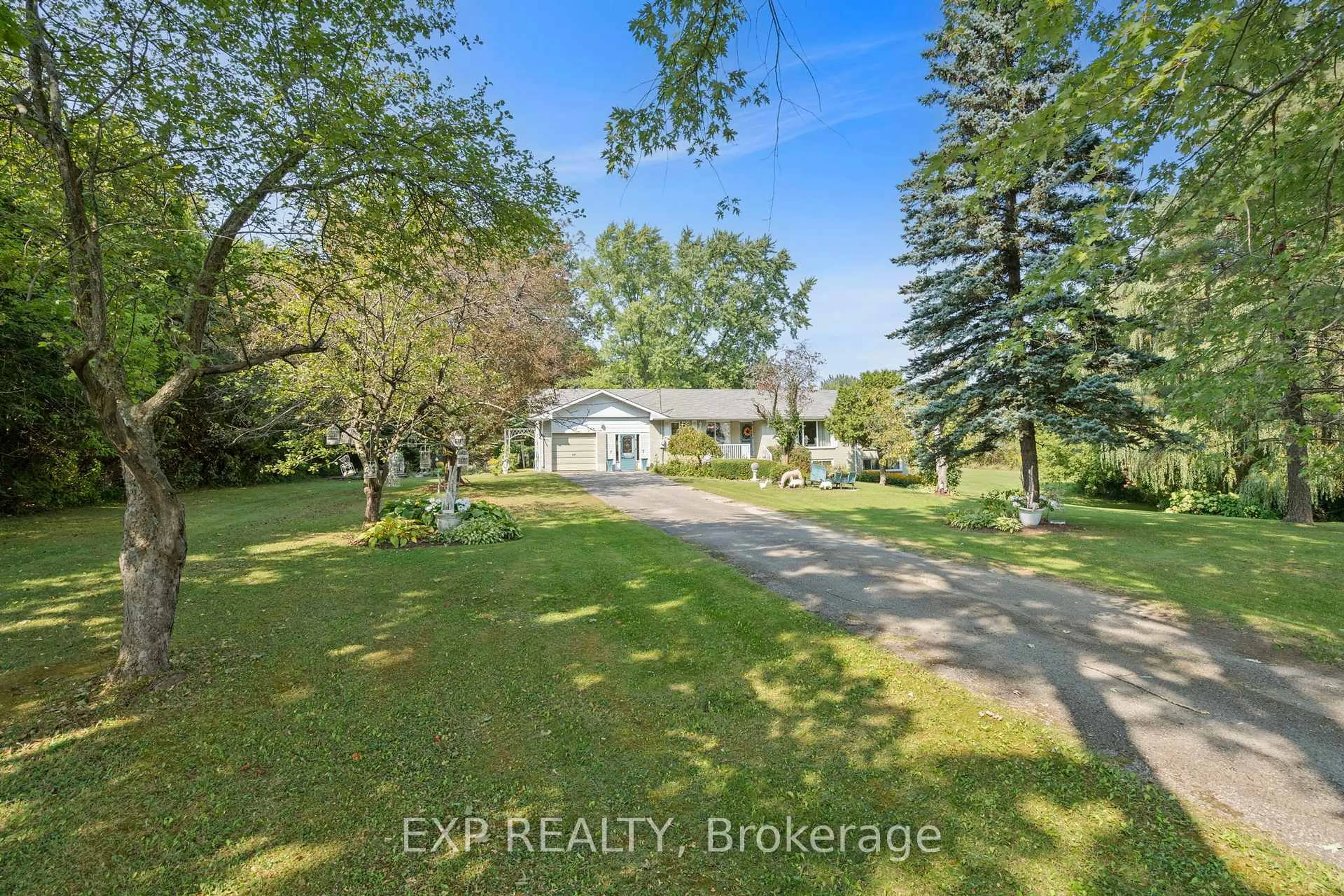A pic from outside/outdoor area/front of a property/back of a property/a pic from drone, water/lake/river/ocean view for 283 Rainbow Ridge Rd, Kawartha Lakes Ontario K0M 2C0