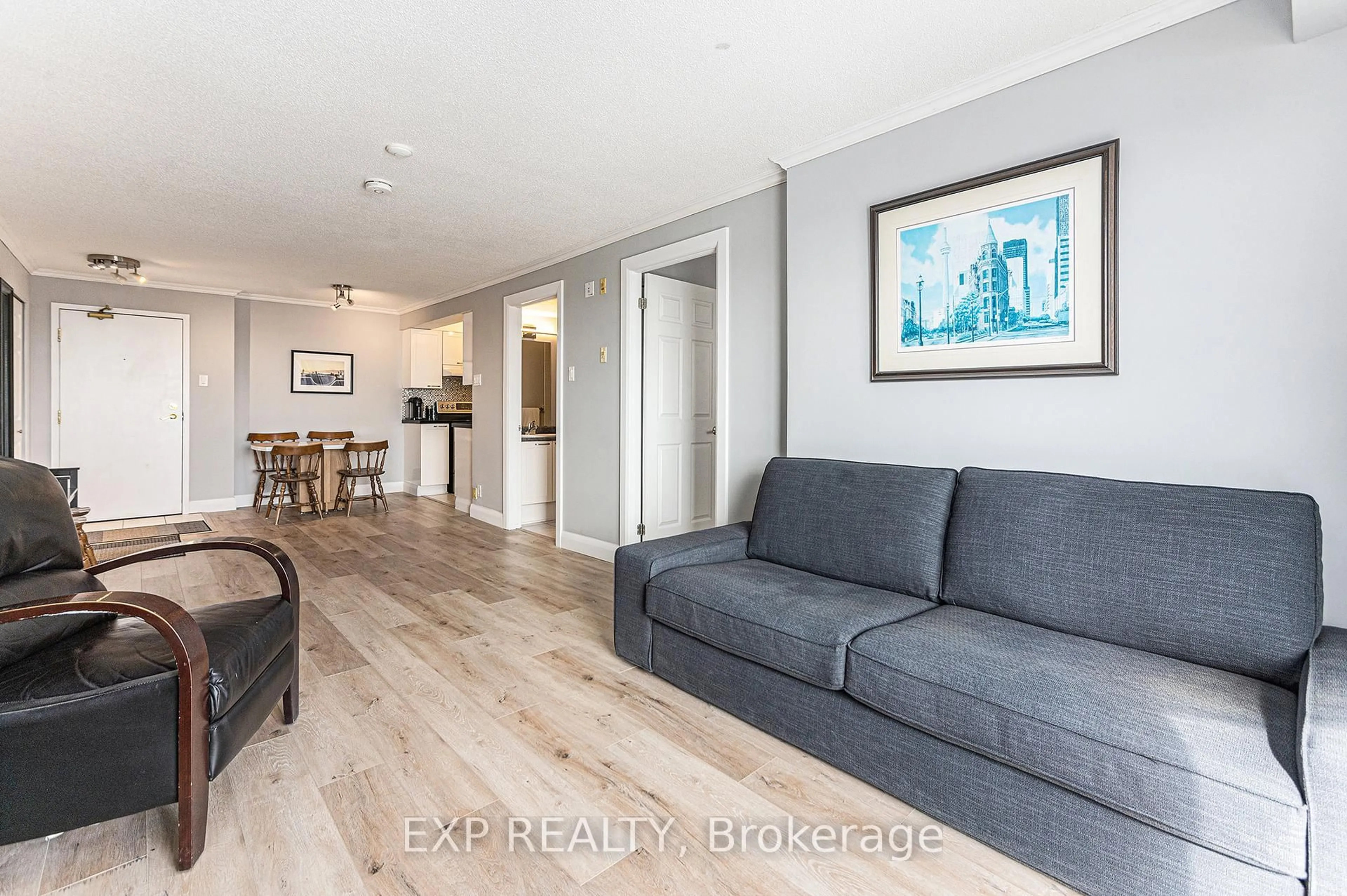 Living room with furniture, wood/laminate floor for 429 Somerset St #1106, Ottawa Ontario K2P 2P5