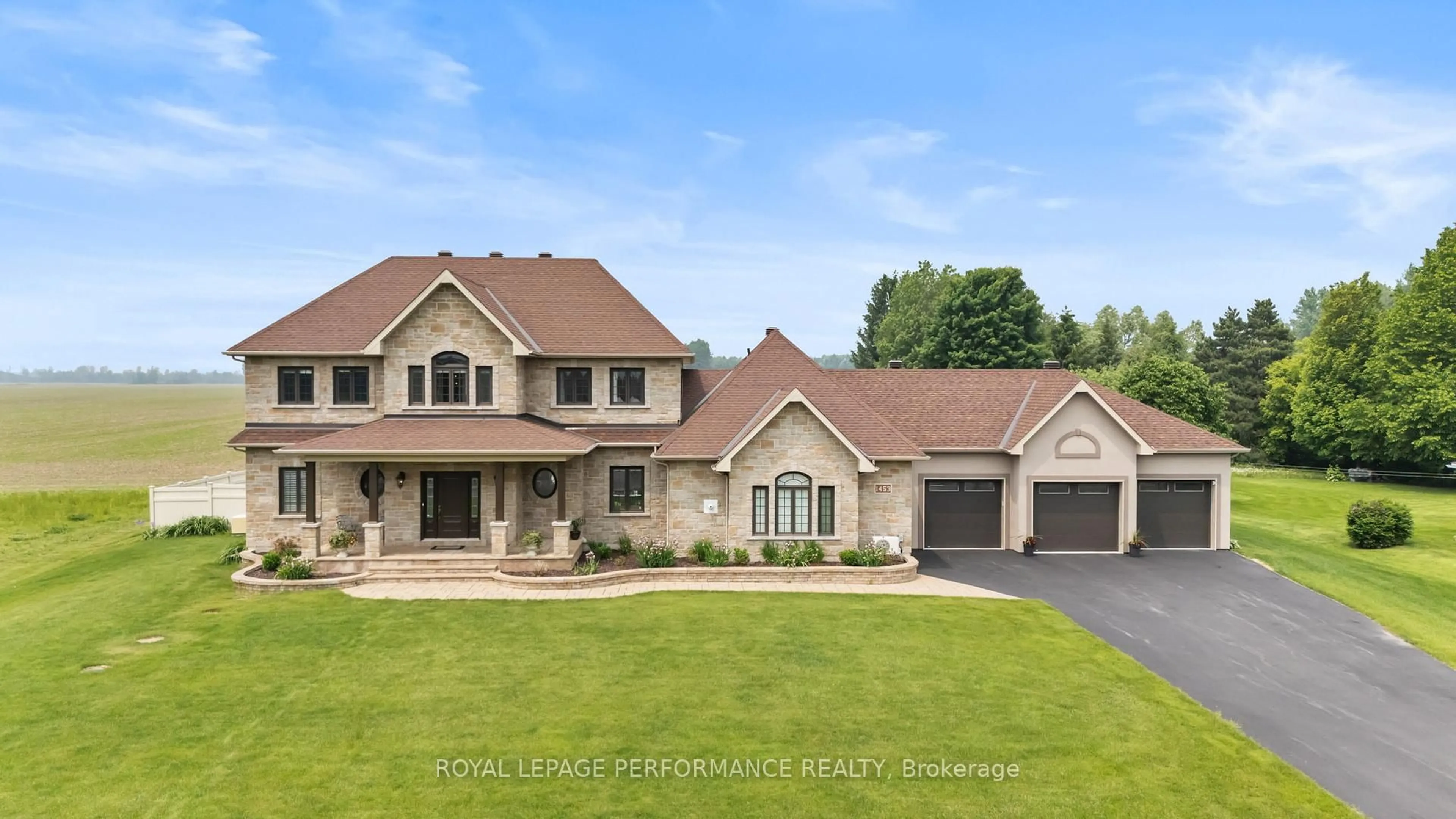 Home with brick exterior material, street for 1453 Notre Dame St, Russell Ontario K0A 1W0