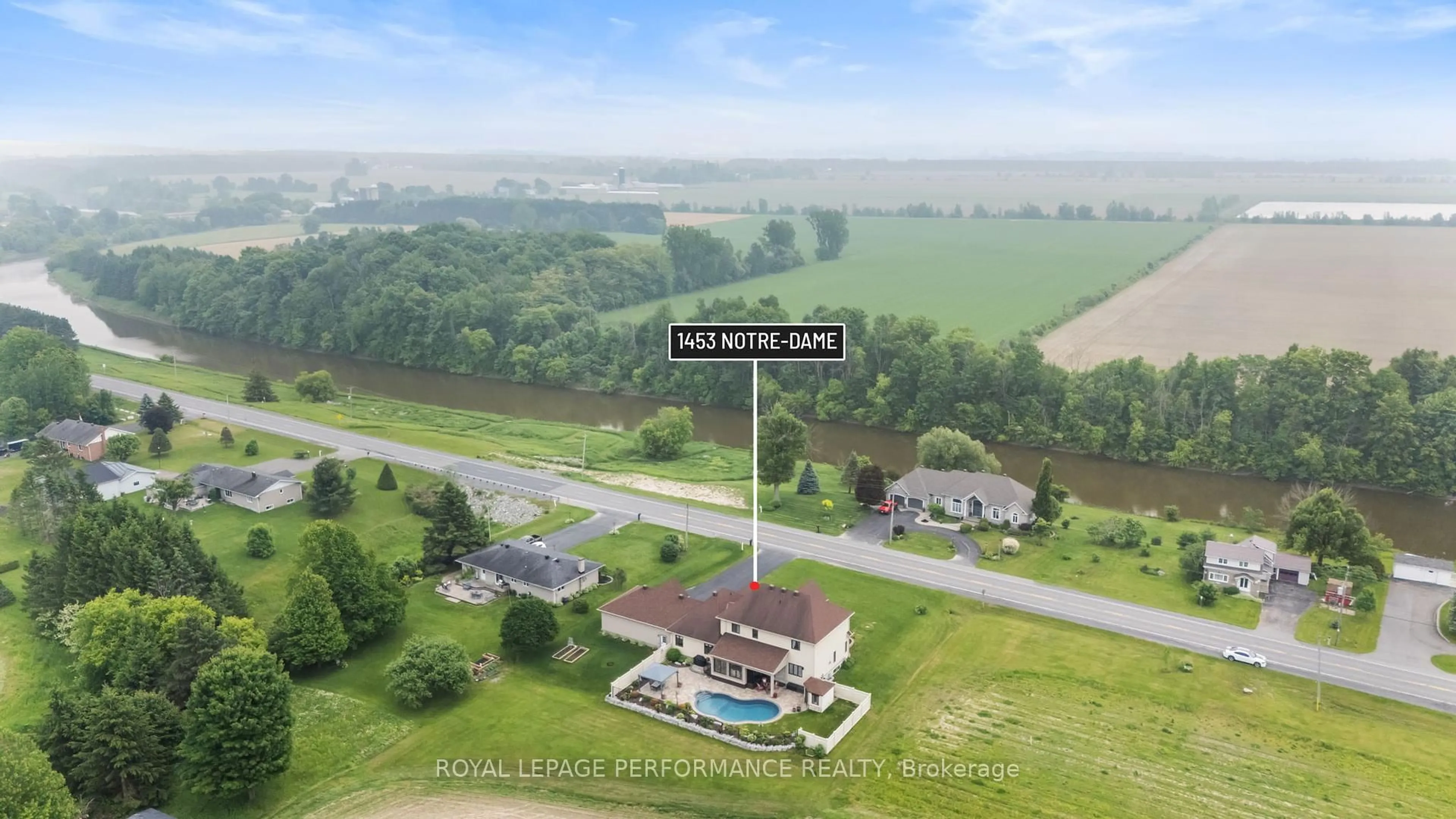 A pic from outside/outdoor area/front of a property/back of a property/a pic from drone, water/lake/river/ocean view for 1453 Notre Dame St, Russell Ontario K0A 1W0