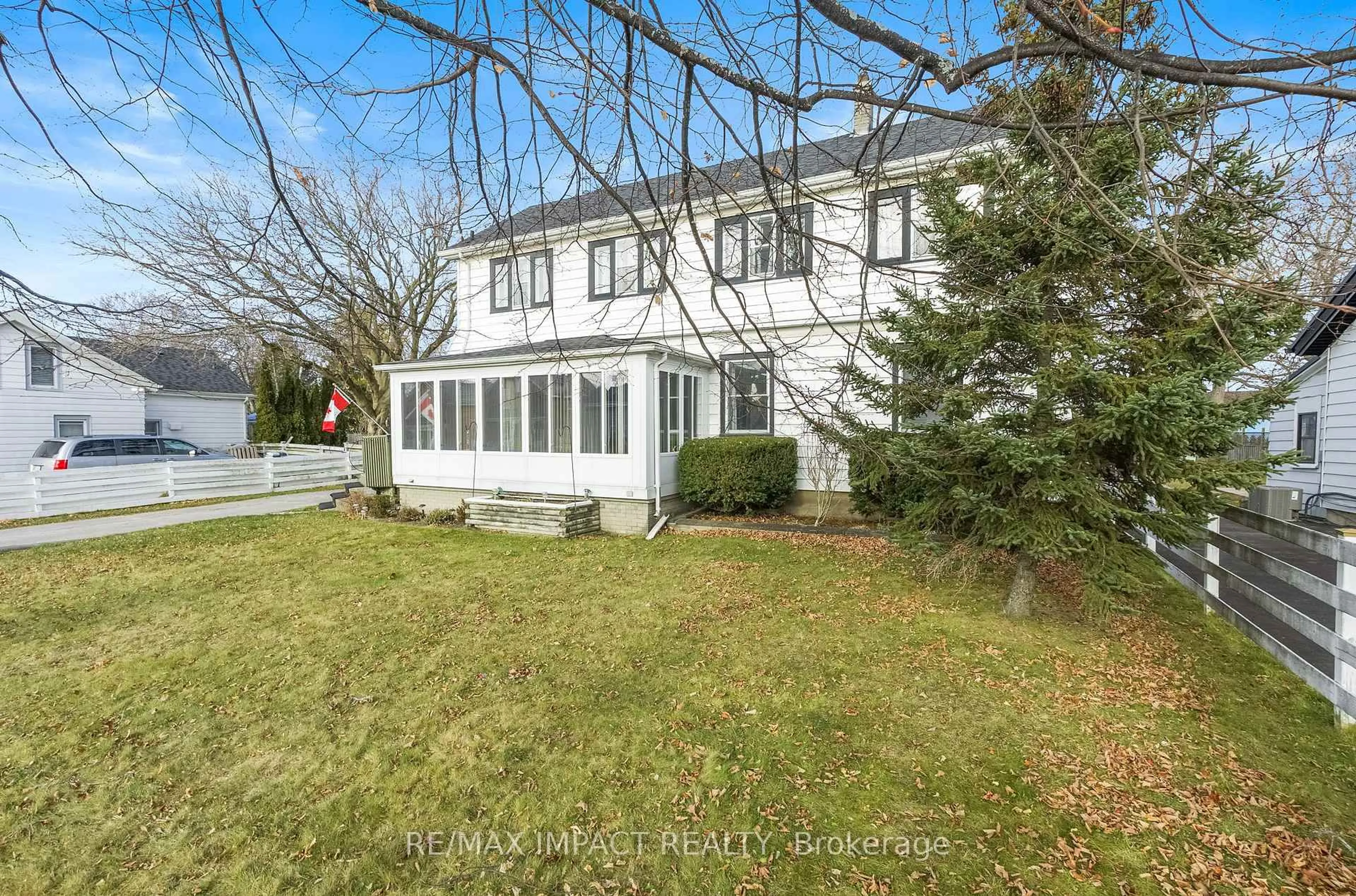 A pic from outside/outdoor area/front of a property/back of a property/a pic from drone, street for 18 Spencer St, Cobourg Ontario K9A 2G3