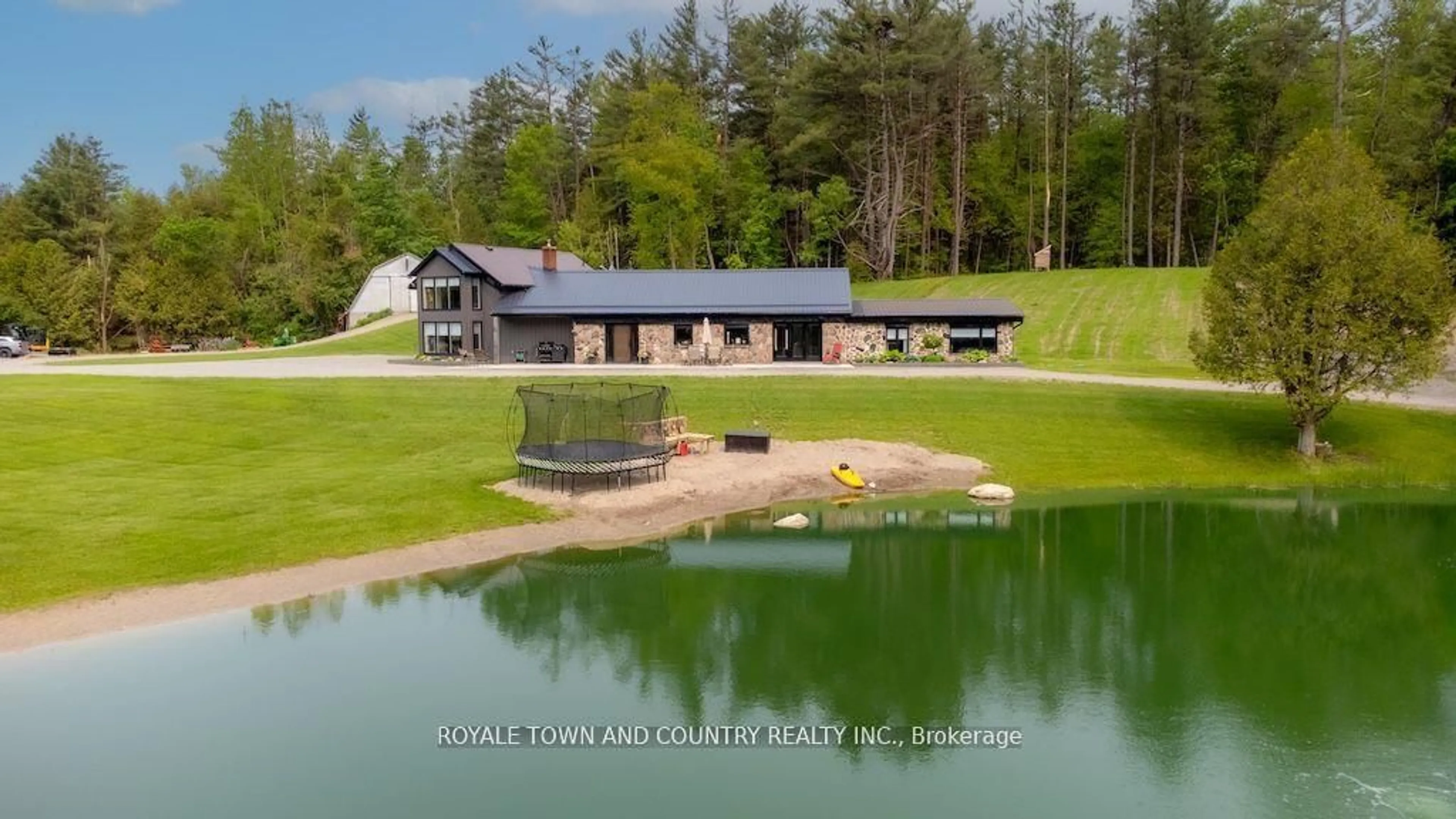 A pic from outside/outdoor area/front of a property/back of a property/a pic from drone, water/lake/river/ocean view for 829 Peace Rd, Kawartha Lakes Ontario K0L 2W0