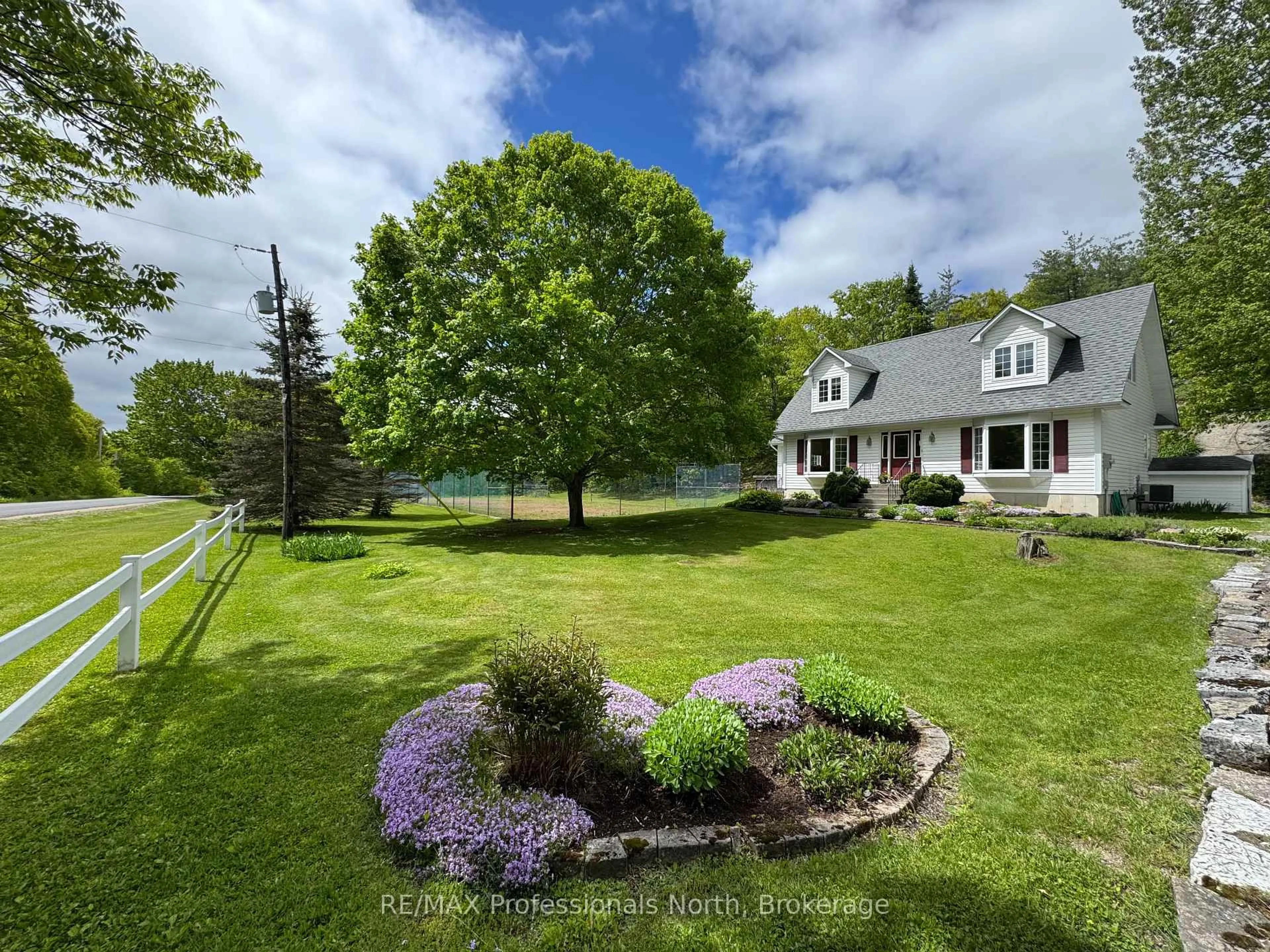 A pic from outside/outdoor area/front of a property/back of a property/a pic from drone, water/lake/river/ocean view for 1119 Deep Bay Rd, Minden Hills Ontario K0M 2K0