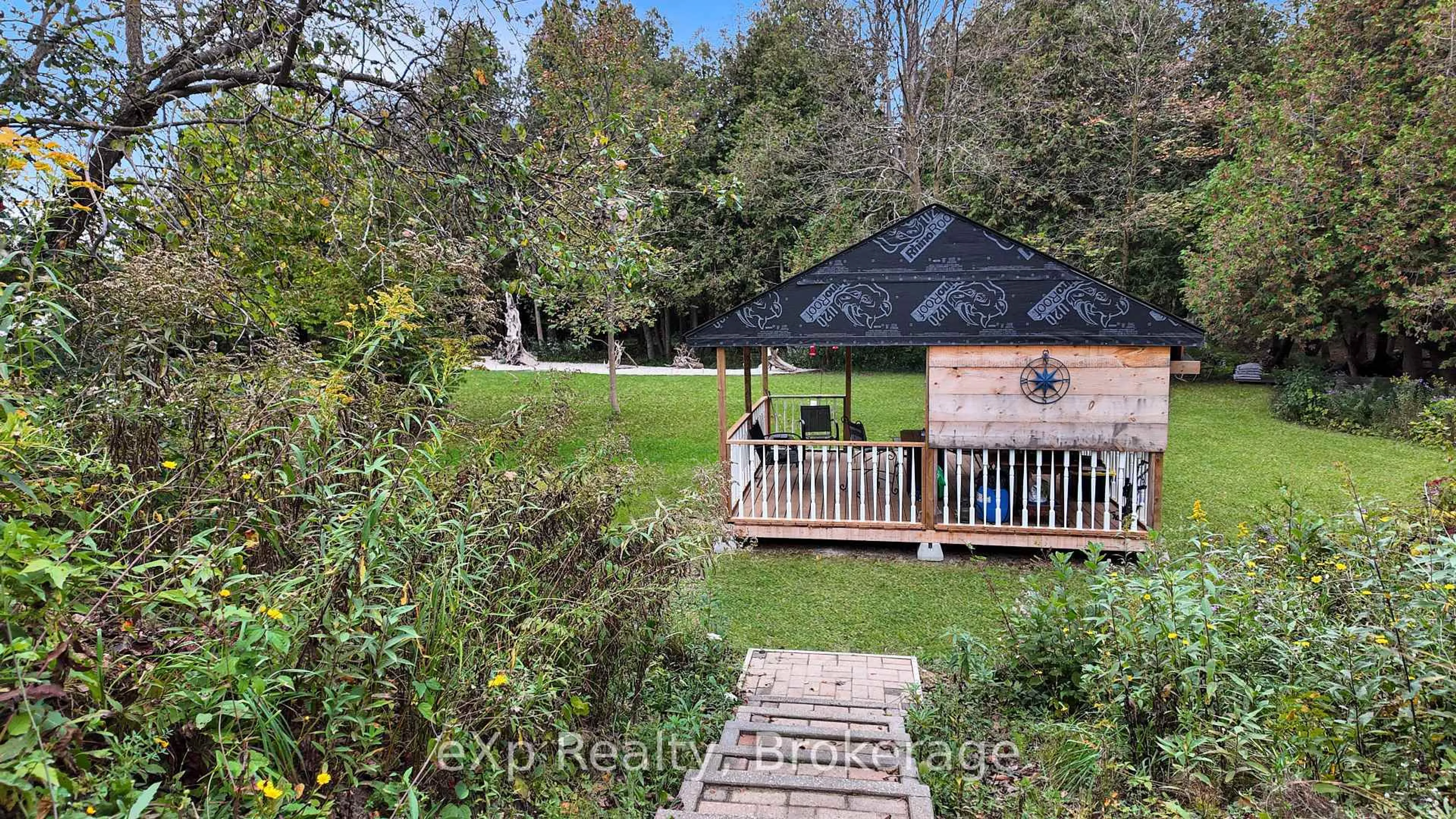 A pic from outside/outdoor area/front of a property/back of a property/a pic from drone, forest/trees view for 119 Old Bridge Rd, West Grey Ontario N4N 3B8