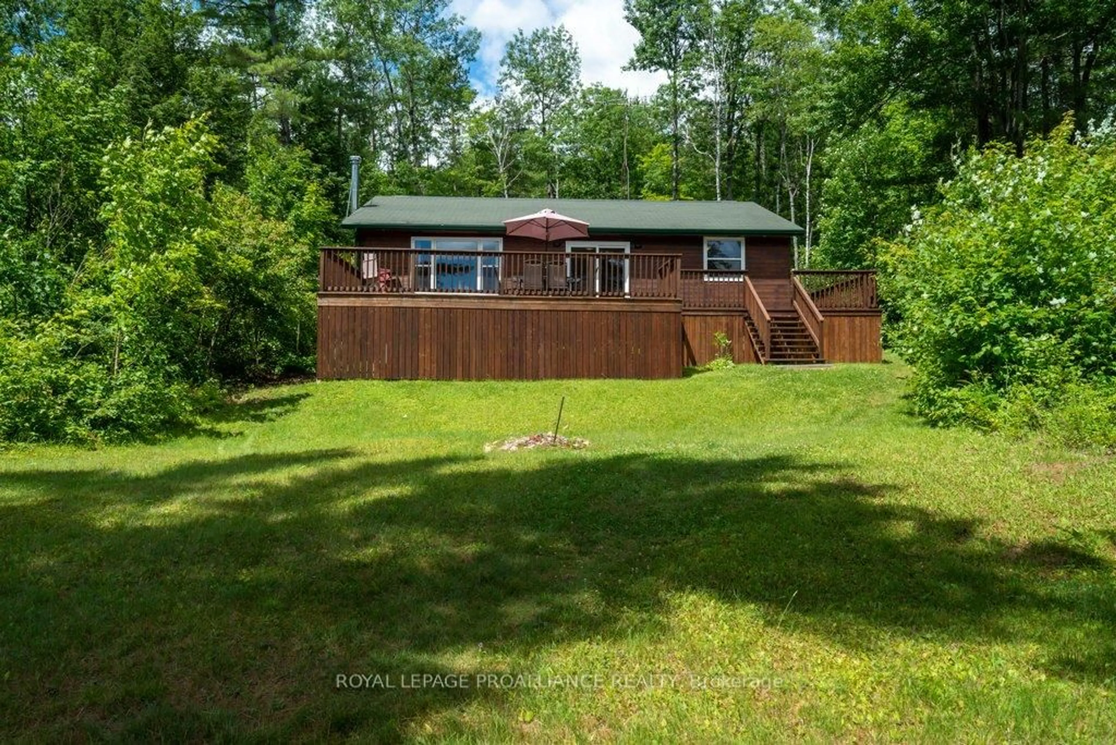 A pic from outside/outdoor area/front of a property/back of a property/a pic from drone, water/lake/river/ocean view for 518 Mazinaw Lake, Cloyne Ontario K0H 1K0