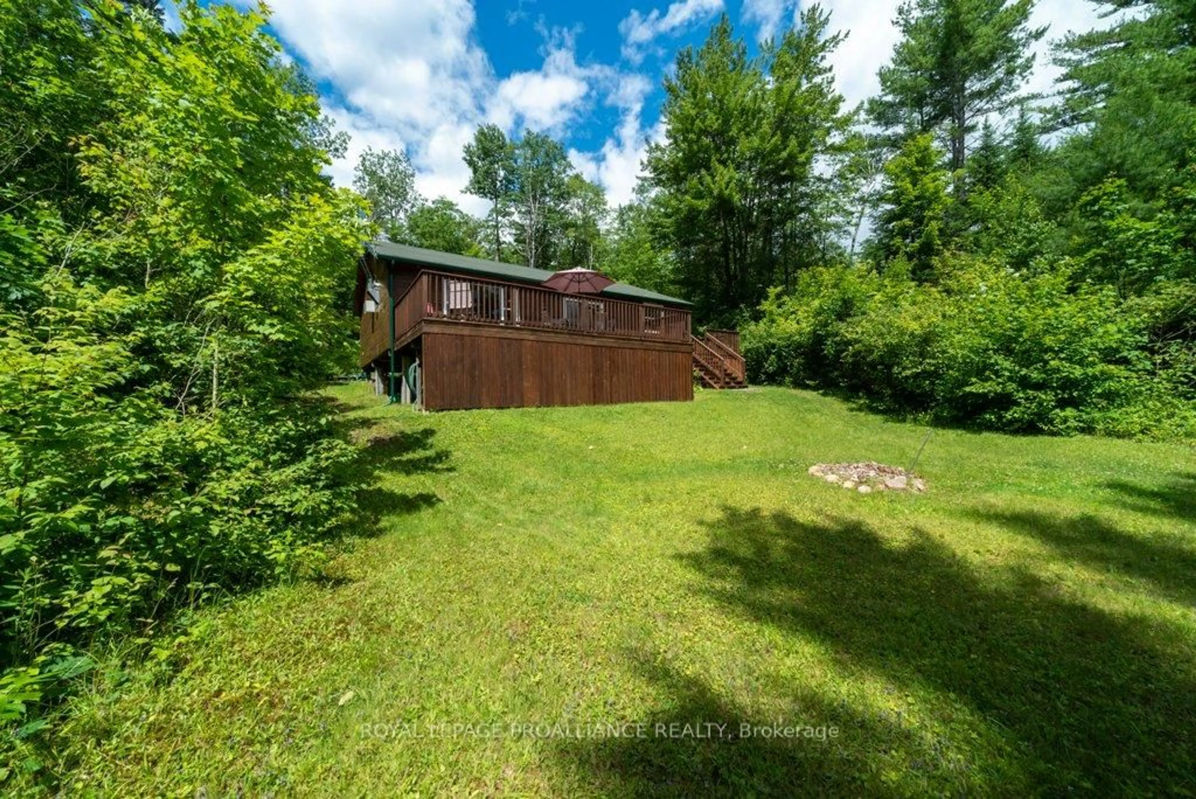 A pic from outside/outdoor area/front of a property/back of a property/a pic from drone, water/lake/river/ocean view for 518 Mazinaw Lake, Cloyne Ontario K0H 1K0