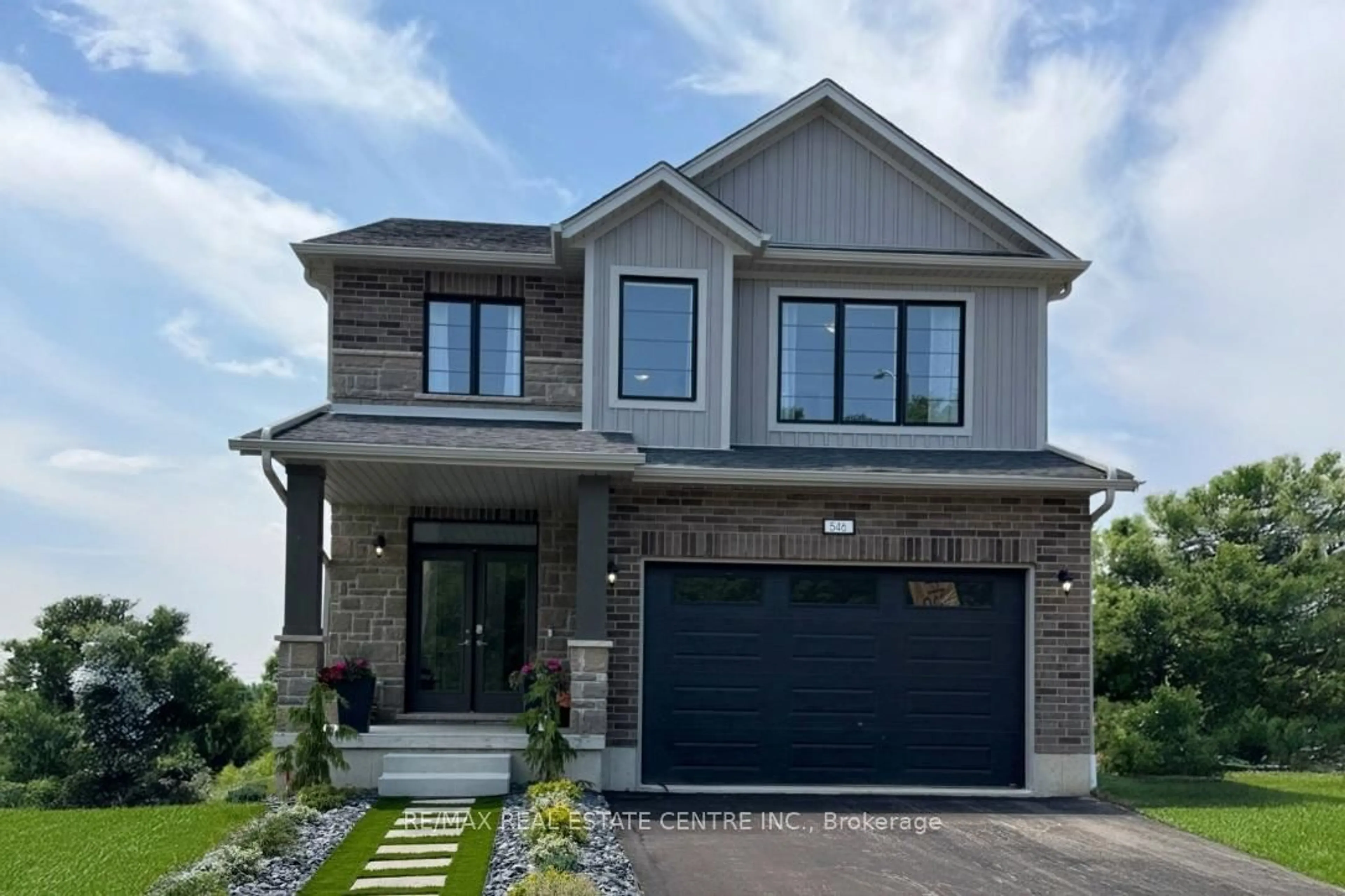 Home with brick exterior material, street for 546 Benninger Dr, Kitchener Ontario N2E 0C9