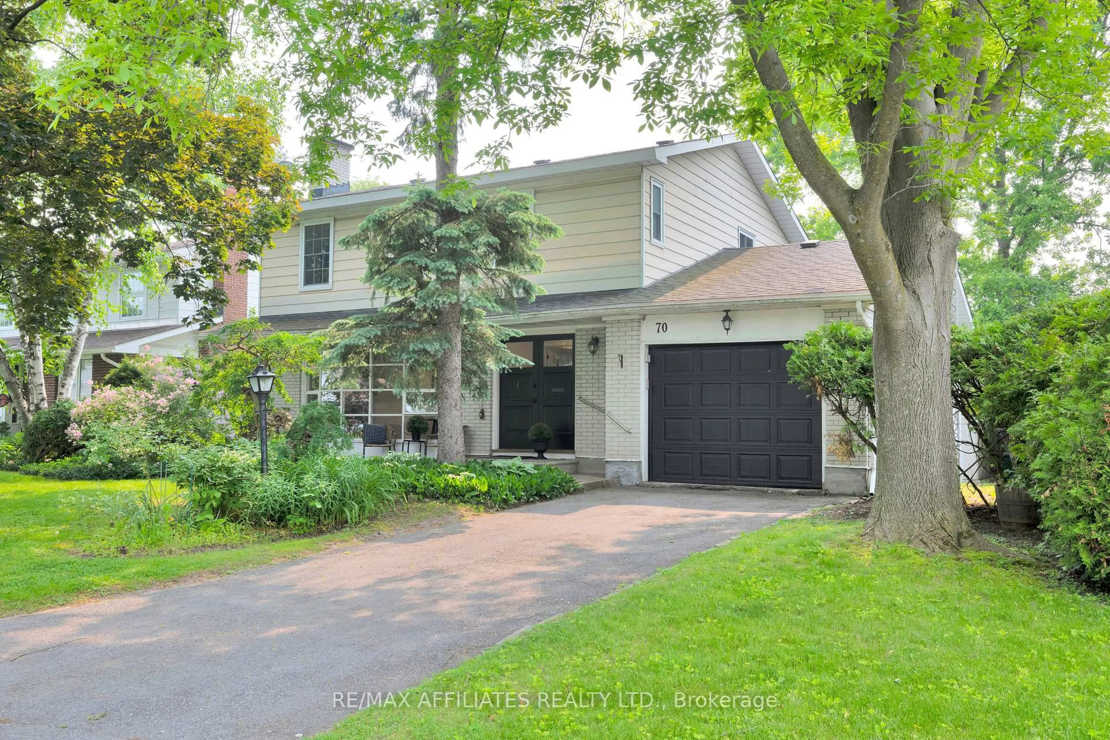 Home with brick exterior material, street for 70 Queensline Dr, Ottawa Ontario K2H 7J5