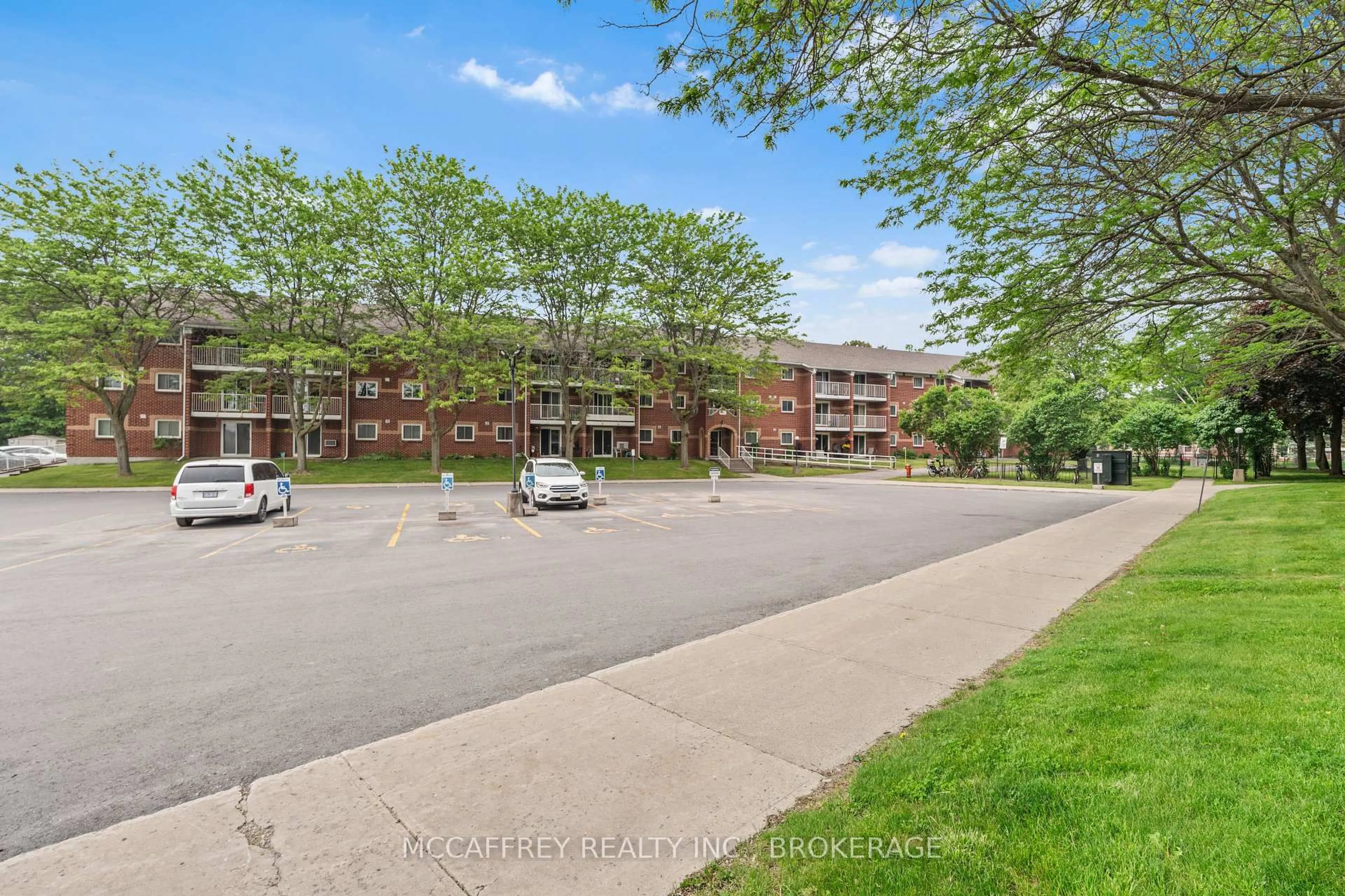 A pic from outside/outdoor area/front of a property/back of a property/a pic from drone, street for 561 Armstrong Rd #204, Kingston Ontario K7M 8J9