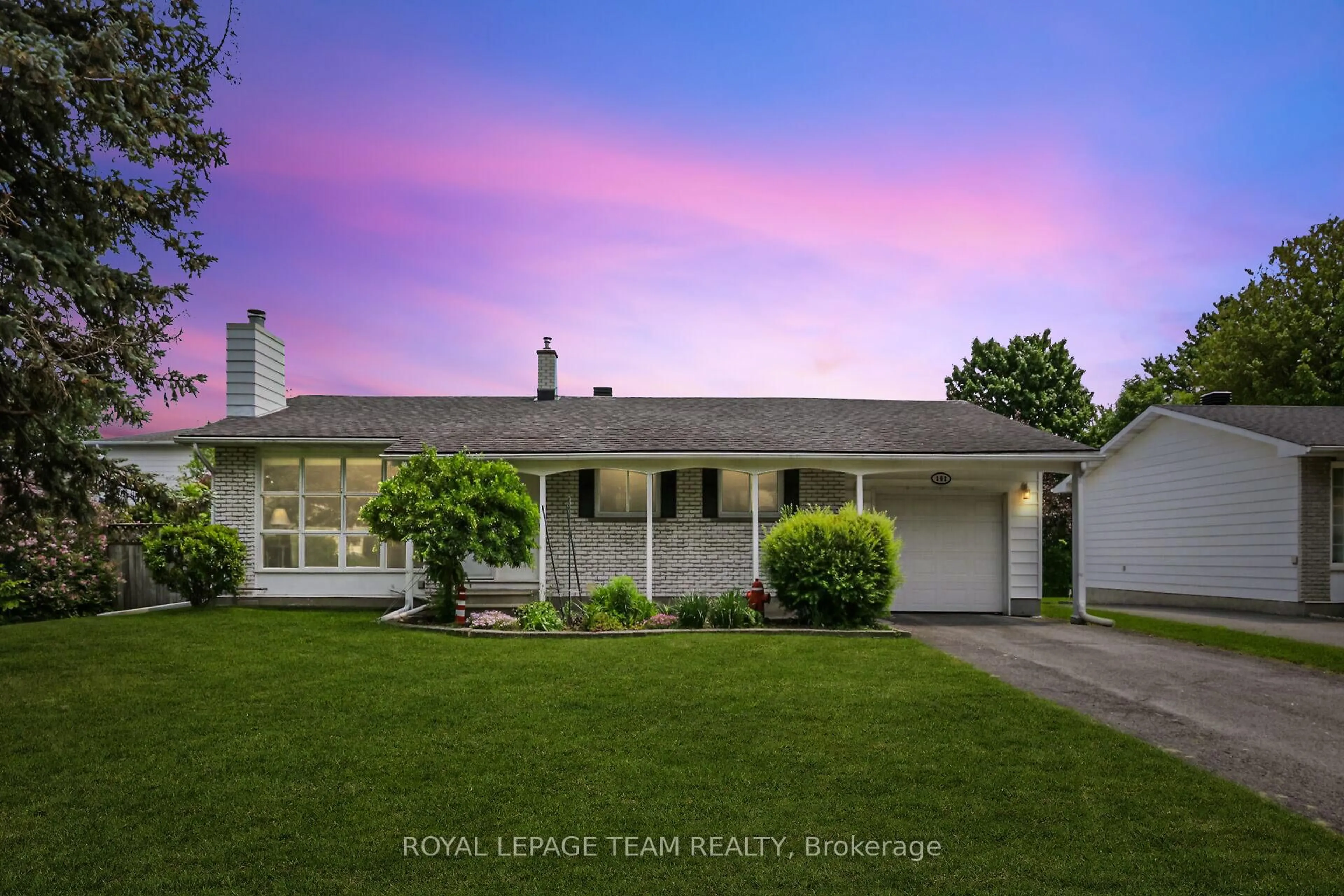 Home with vinyl exterior material, street for 102 Oriole Ave, Kanata Ontario K2L 1E7