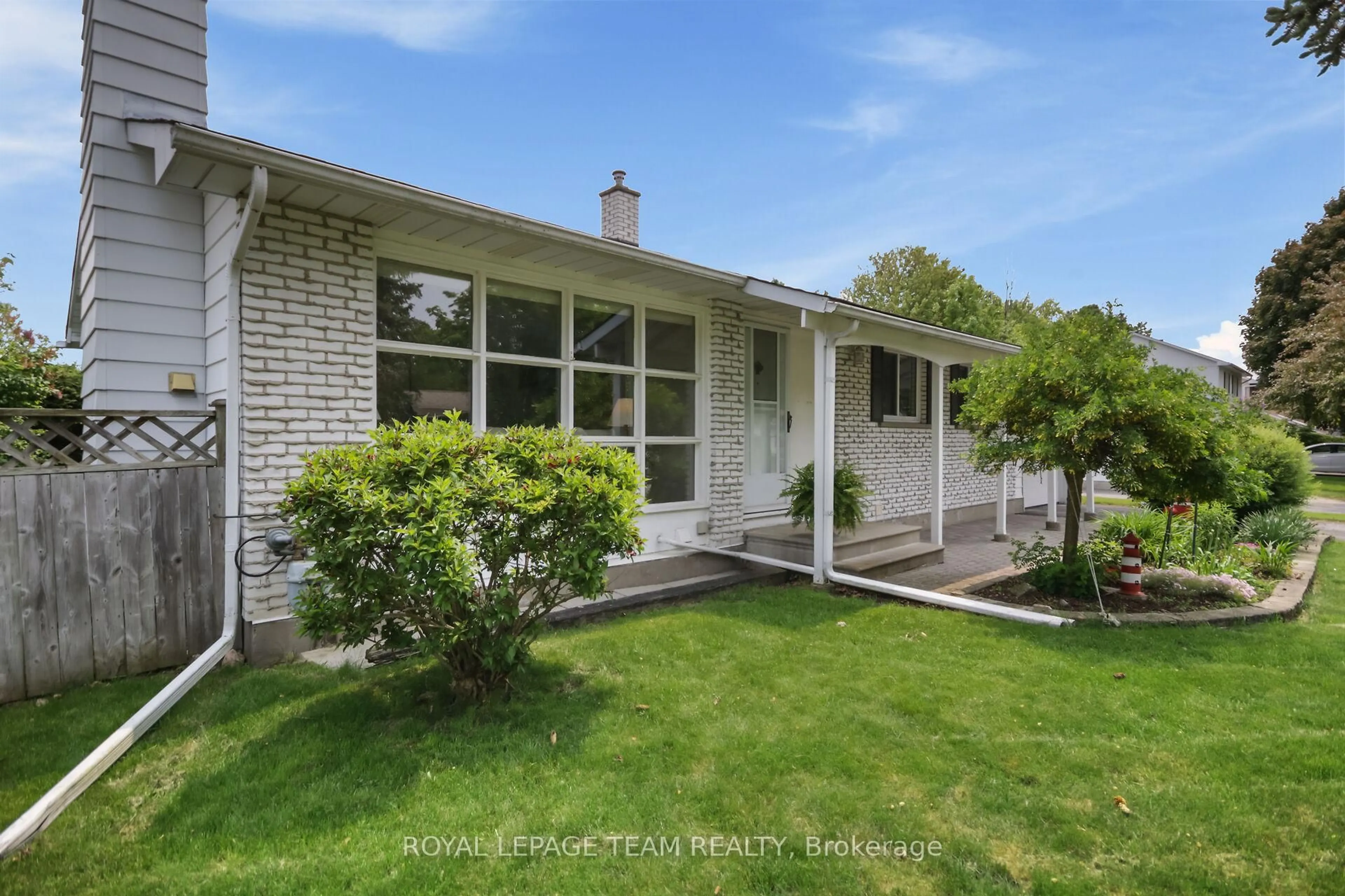 Home with vinyl exterior material, street for 102 Oriole Ave, Kanata Ontario K2L 1E7