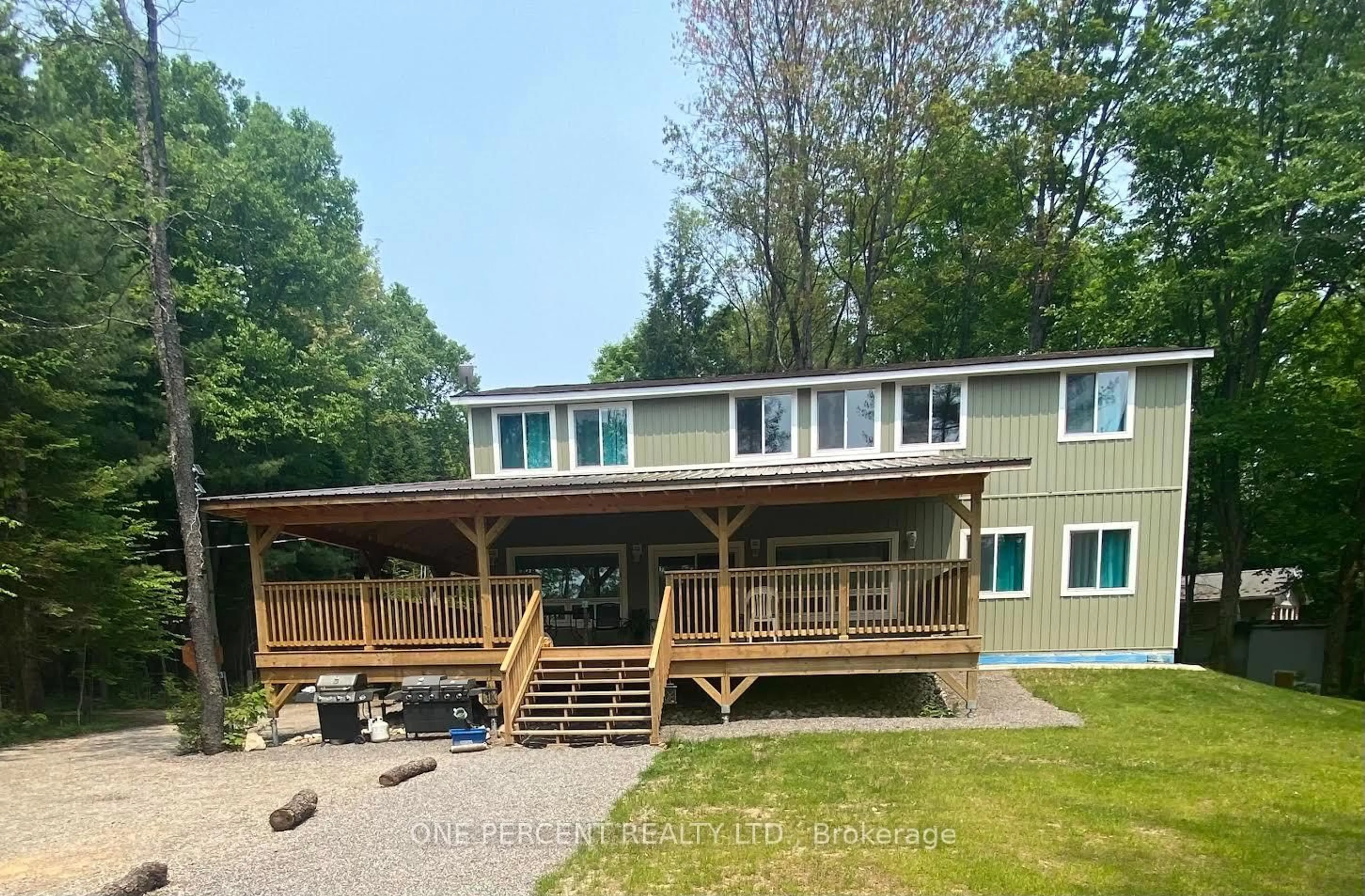 A pic from outside/outdoor area/front of a property/back of a property/a pic from drone, unknown for 1013 Goodlife Lane, Algonquin Highlands Ontario P0A 1E0