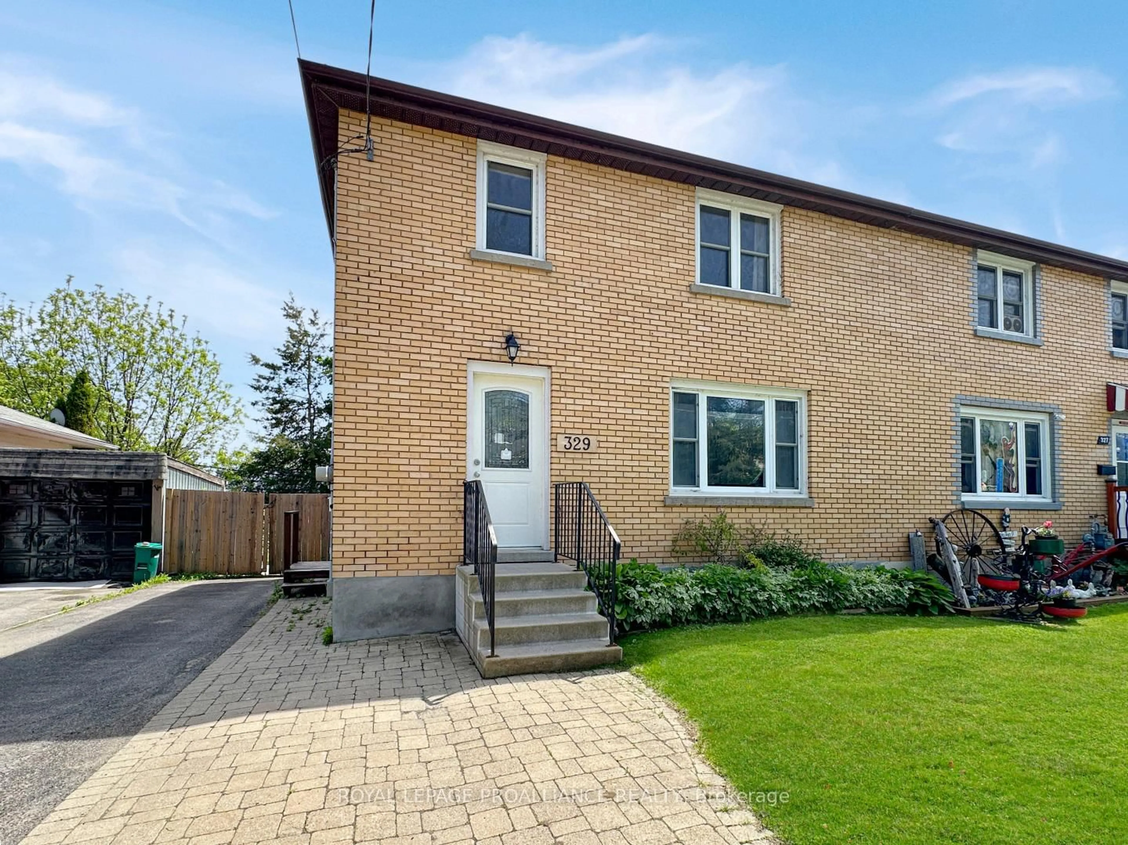 Home with brick exterior material, street for 329 Bridge St, Belleville Ontario K8N 1P5