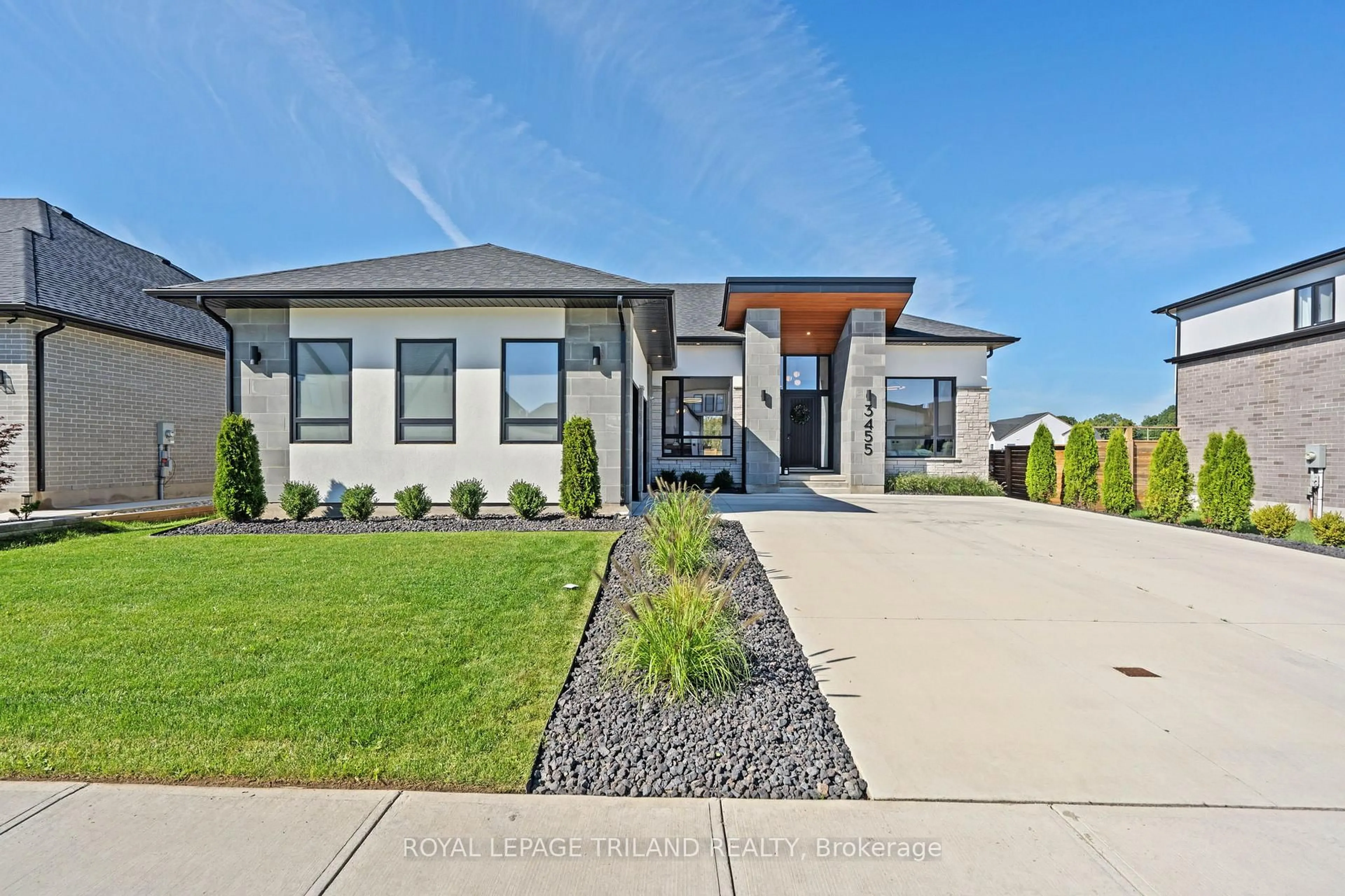 Home with brick exterior material, street for 3455 Grand Oak Crossing, London South Ontario N6P 0G7