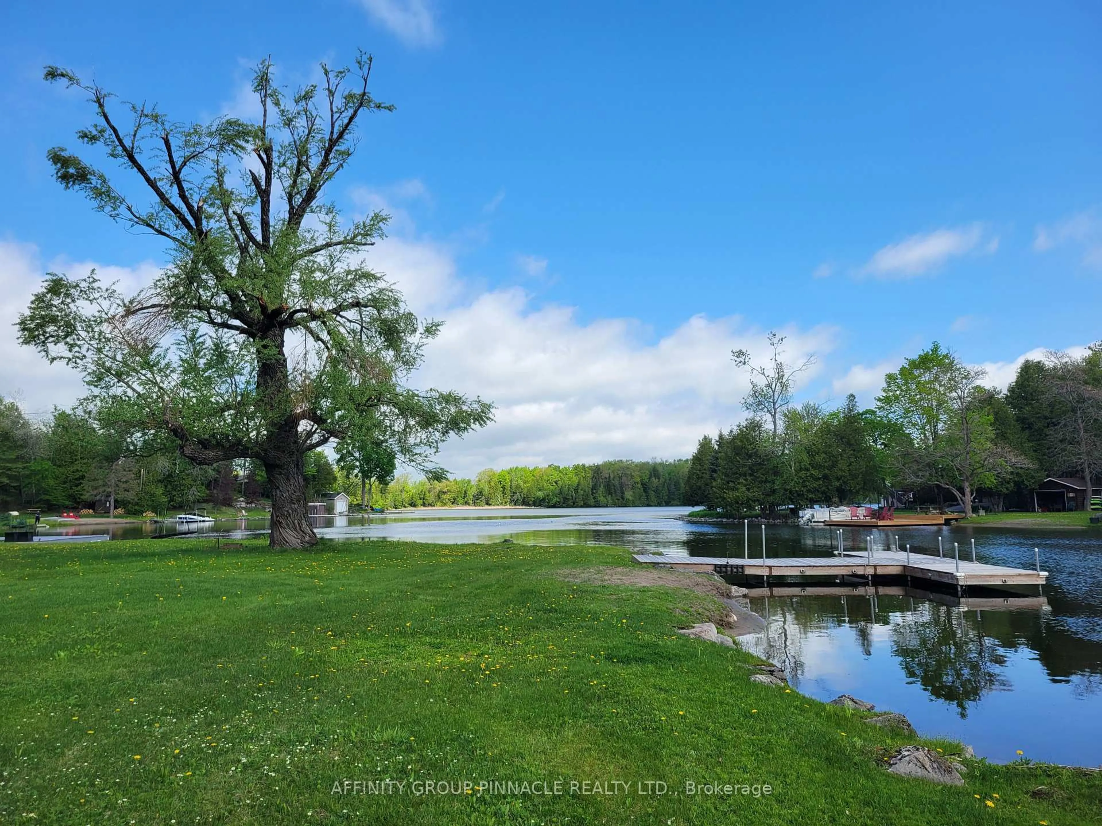 A pic from outside/outdoor area/front of a property/back of a property/a pic from drone, water/lake/river/ocean view for 2473 Selwyn Bay Lane, Selwyn Ontario K0L 2H0