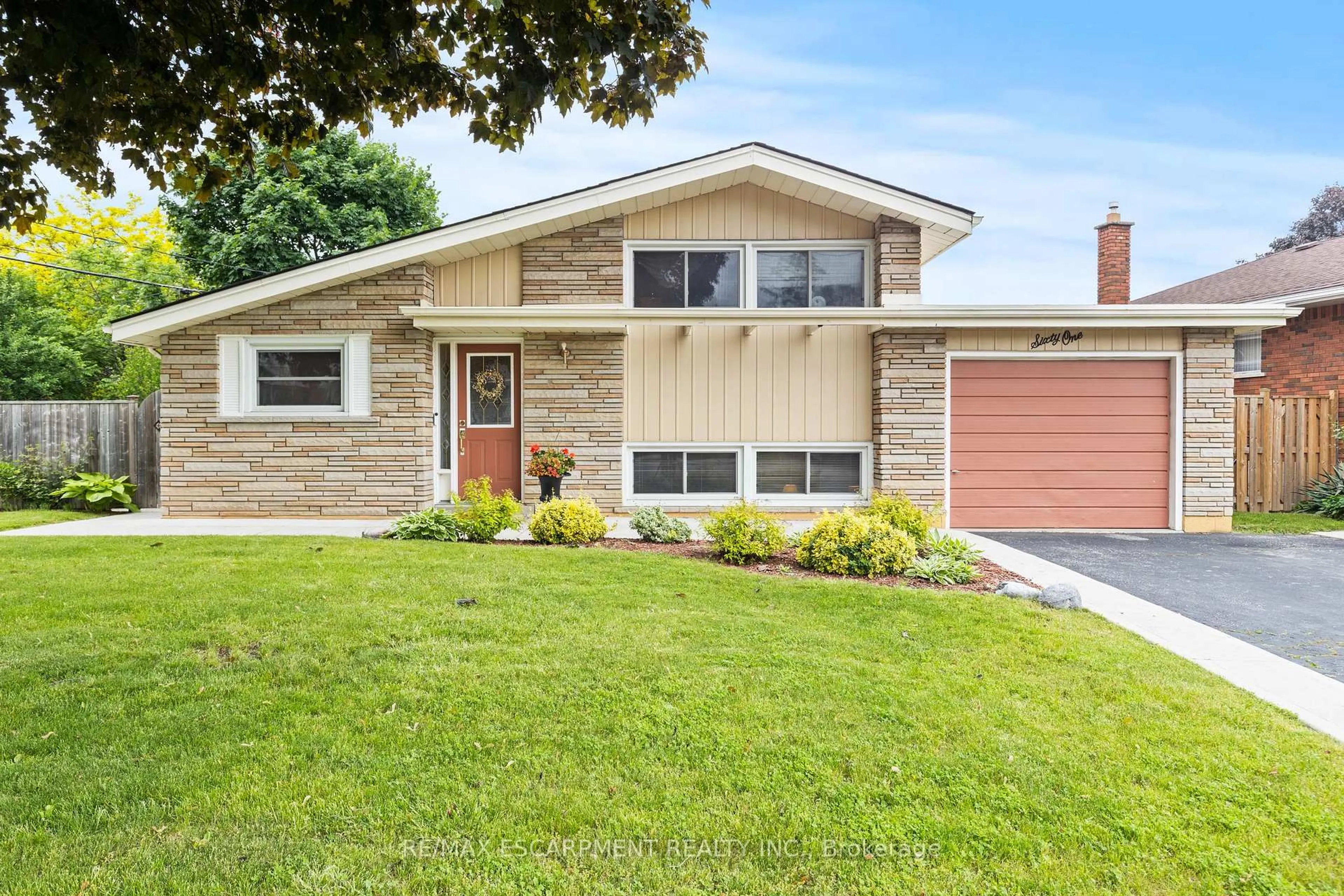 Home with brick exterior material, street for 61 Orphir Rd, Hamilton Ontario L8K 3Z3