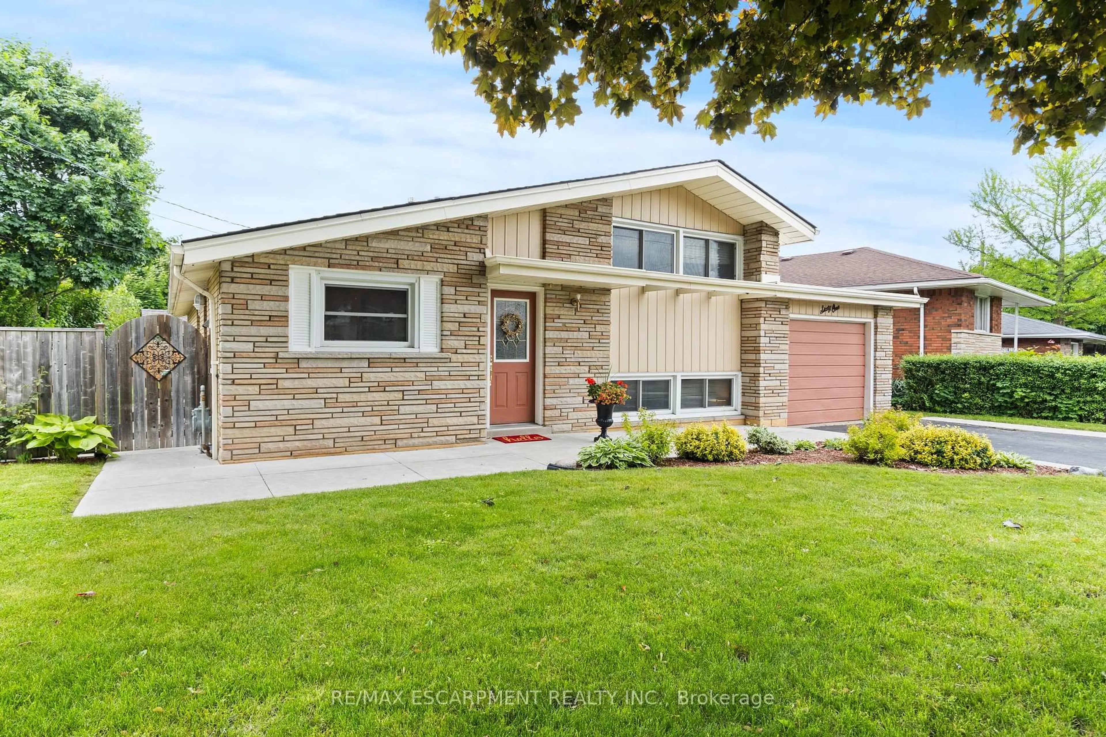 Home with brick exterior material, street for 61 Orphir Rd, Hamilton Ontario L8K 3Z3