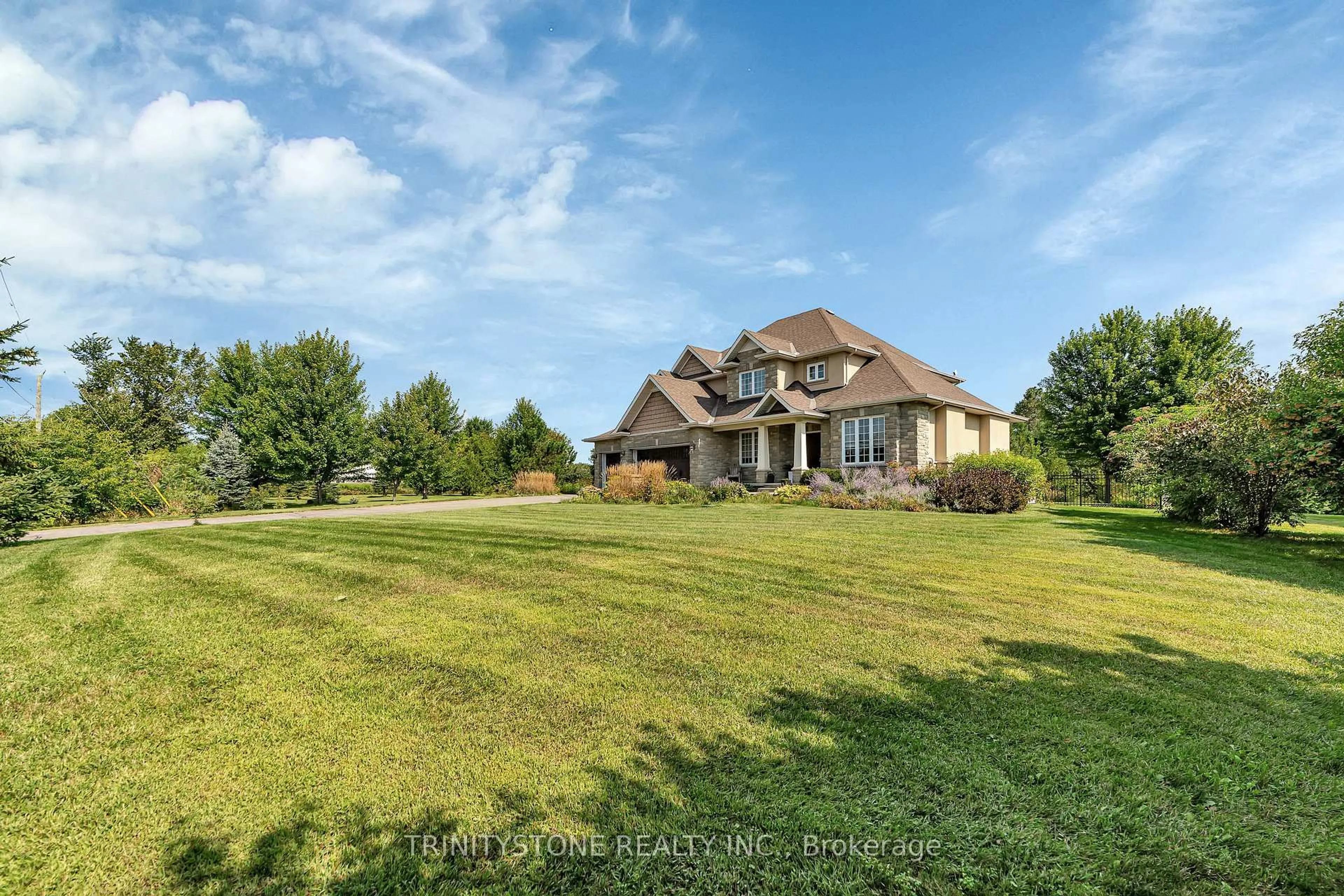 A pic from outside/outdoor area/front of a property/back of a property/a pic from drone, unknown for 15 Canadian Dr, Ashton Ontario K0A 1B0