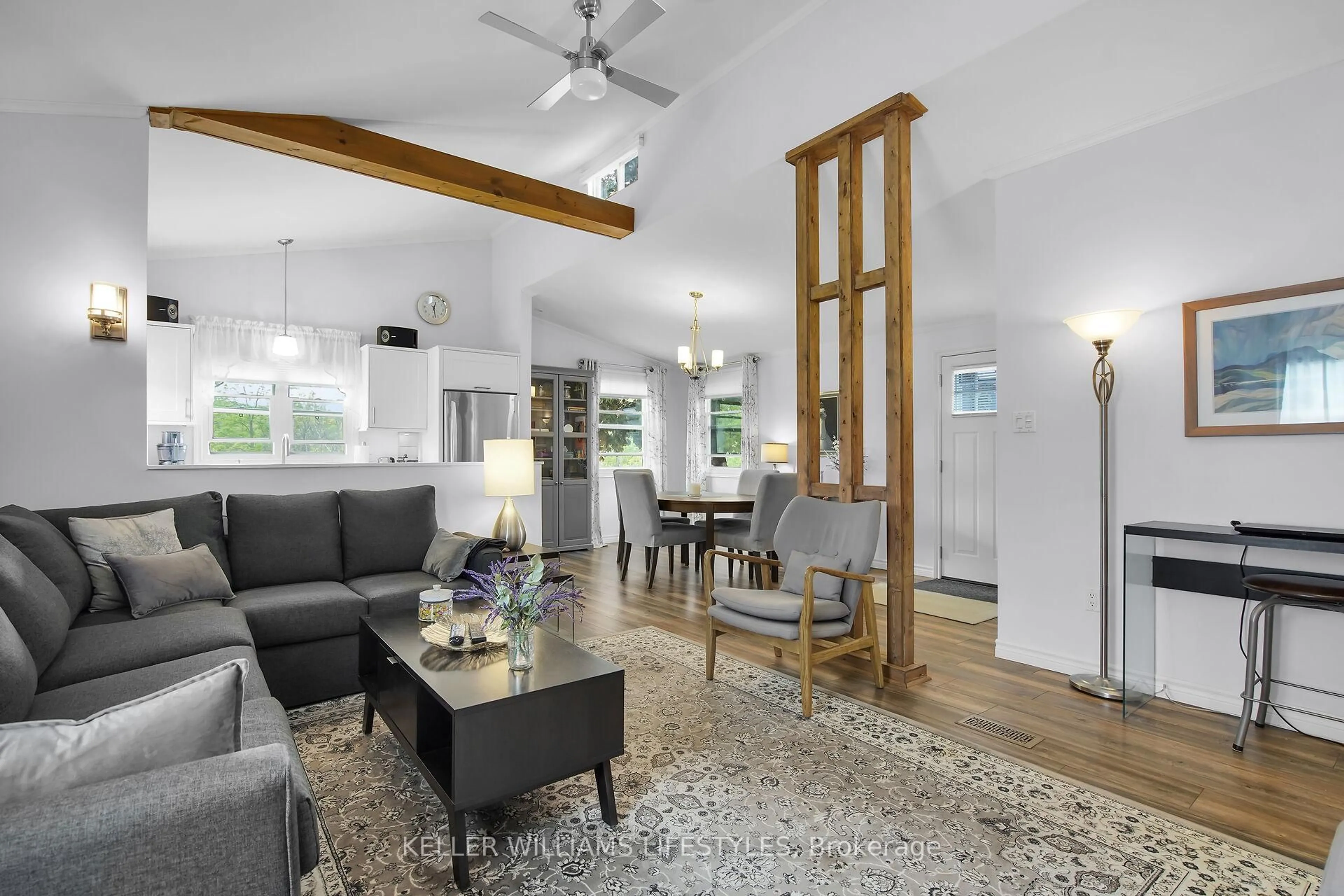Living room with furniture, wood/laminate floor for 198 Springbank Dr #106, London South Ontario N6J 1G1