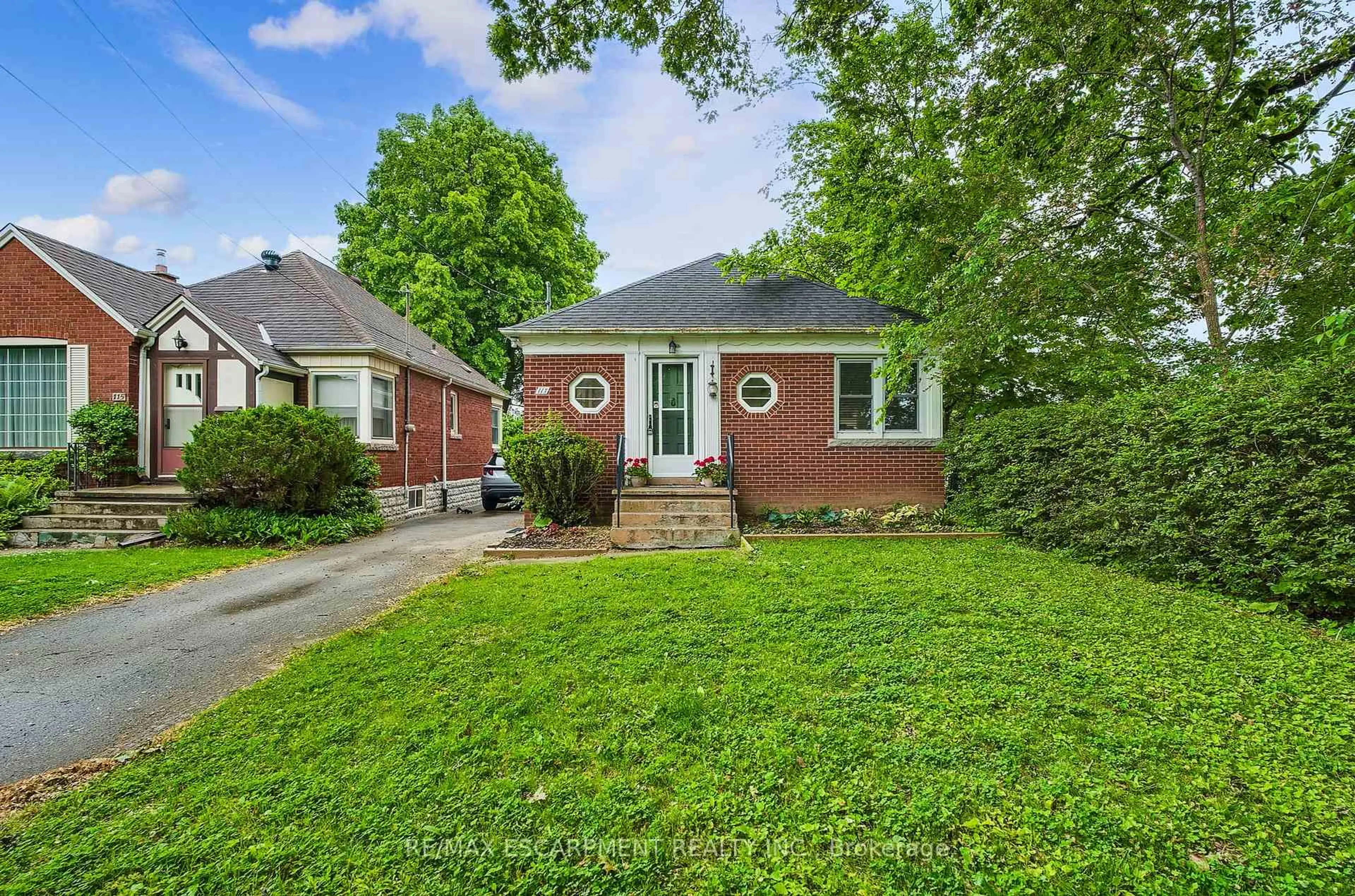 Home with brick exterior material, street for 117 Norwood Rd, Hamilton Ontario L8S 3R3