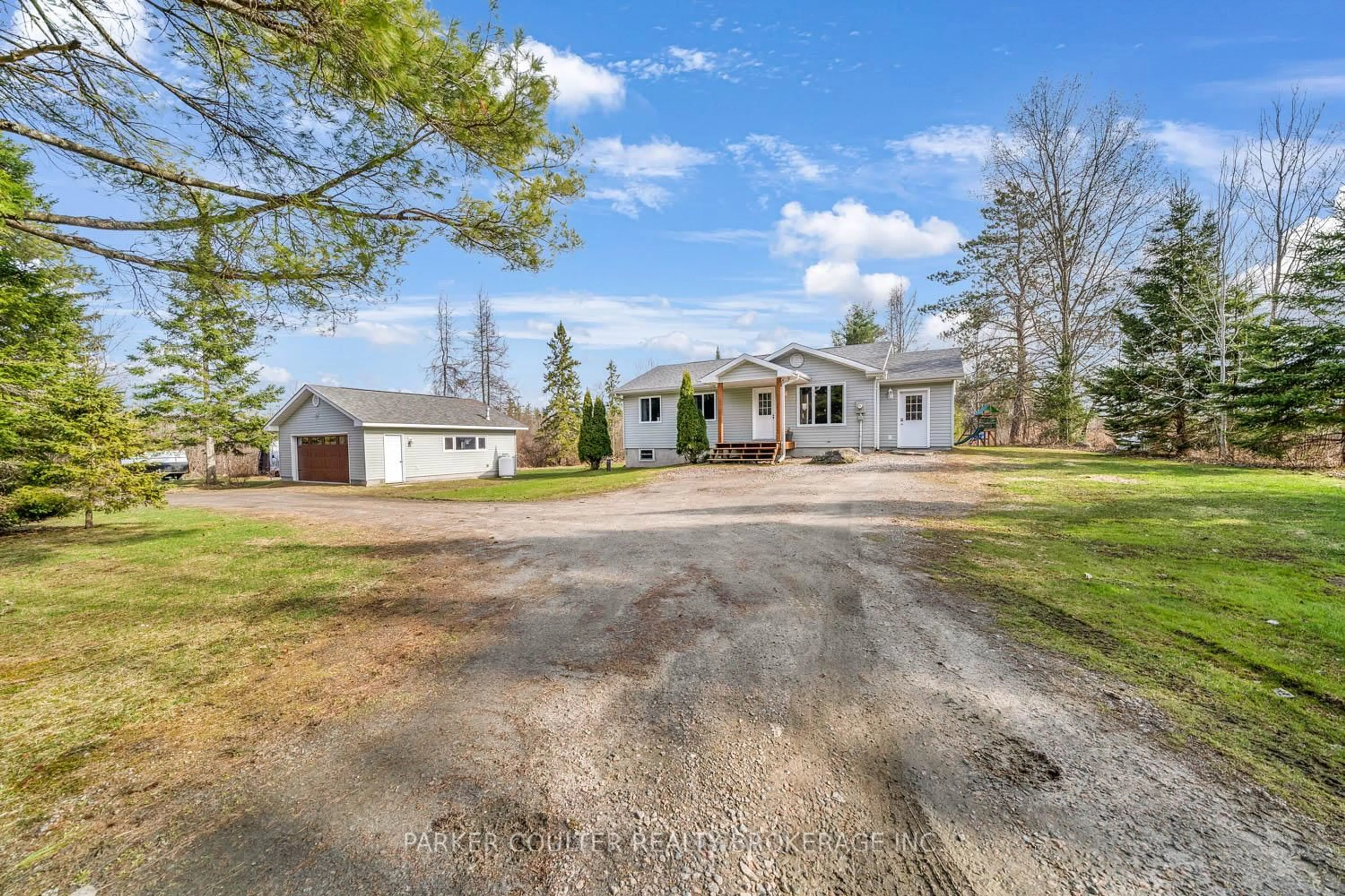 A pic from outside/outdoor area/front of a property/back of a property/a pic from drone, street for 115 Mccans Rd, Seguin Ontario P0C 1J0