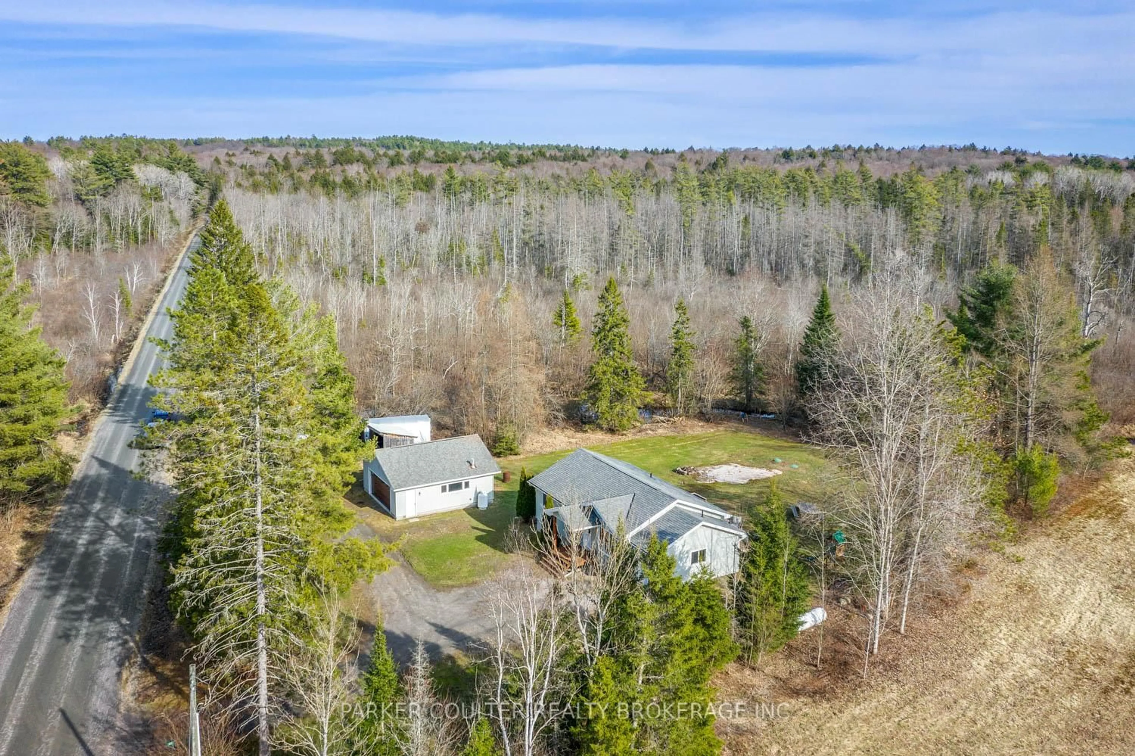 A pic from outside/outdoor area/front of a property/back of a property/a pic from drone, forest/trees view for 115 Mccans Rd, Seguin Ontario P0C 1J0