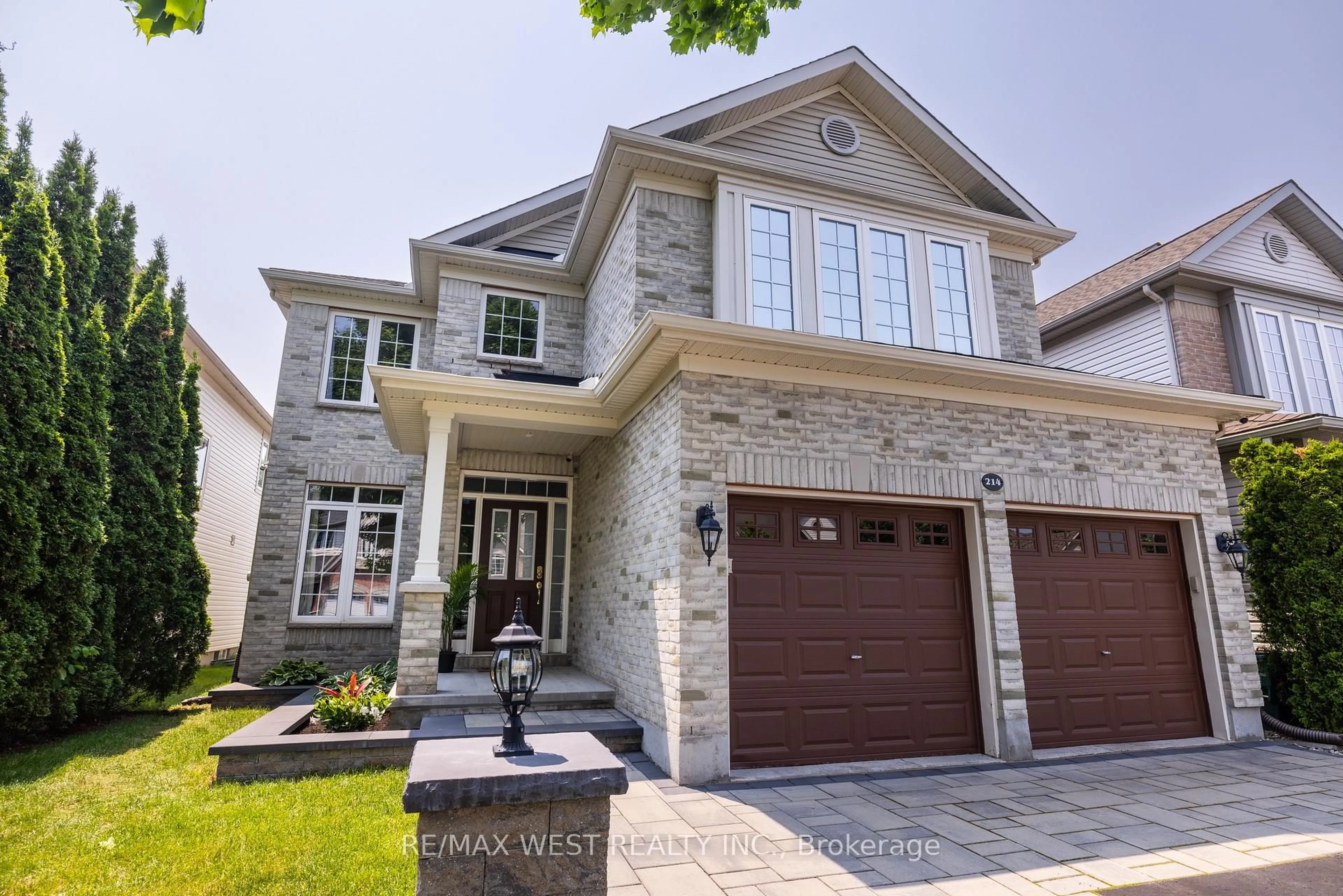 Home with brick exterior material, street for 214 Castlegarth Cres, Ottawa Ontario K2J 5N6