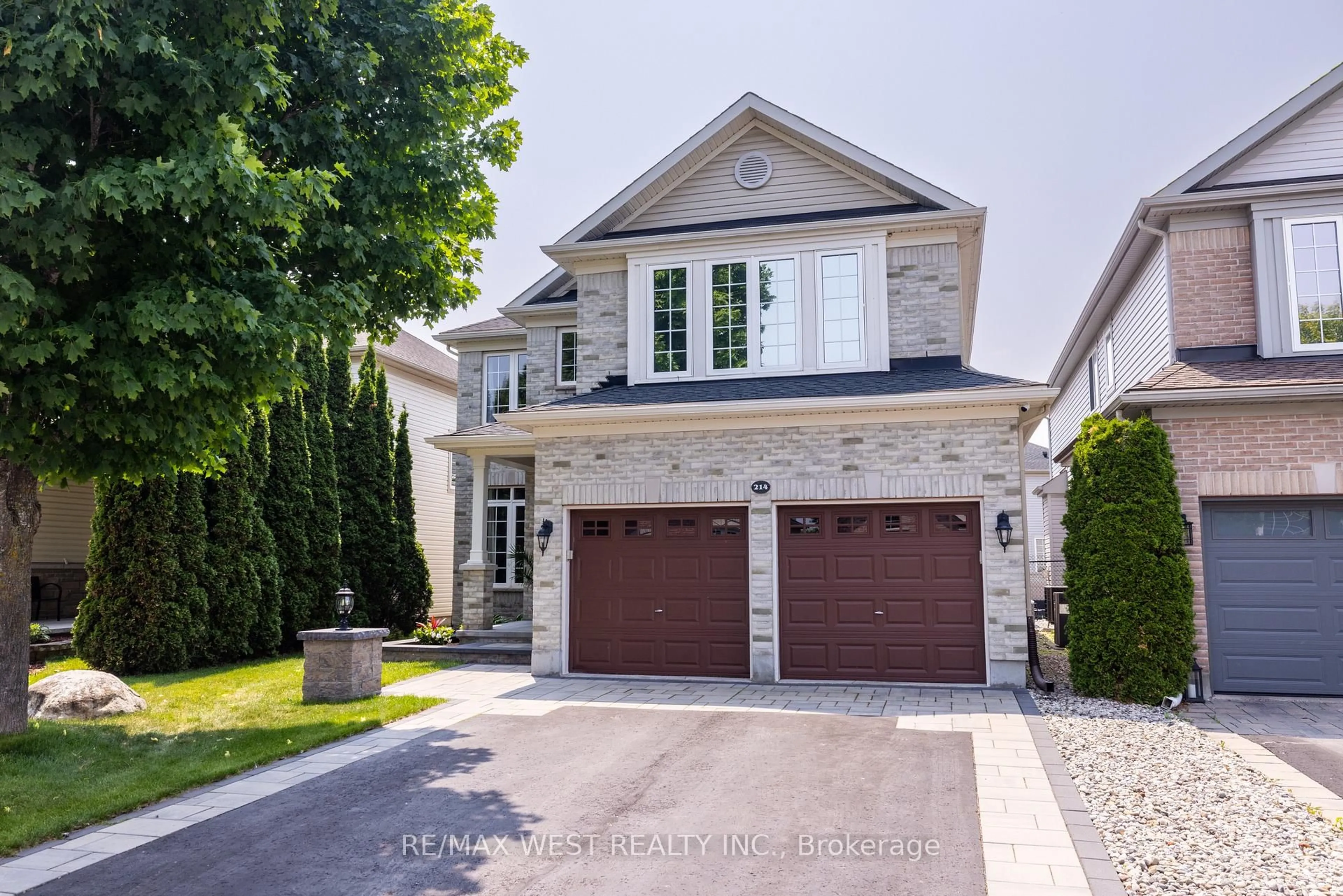 Home with brick exterior material, street for 214 Castlegarth Cres, Ottawa Ontario K2J 5N6