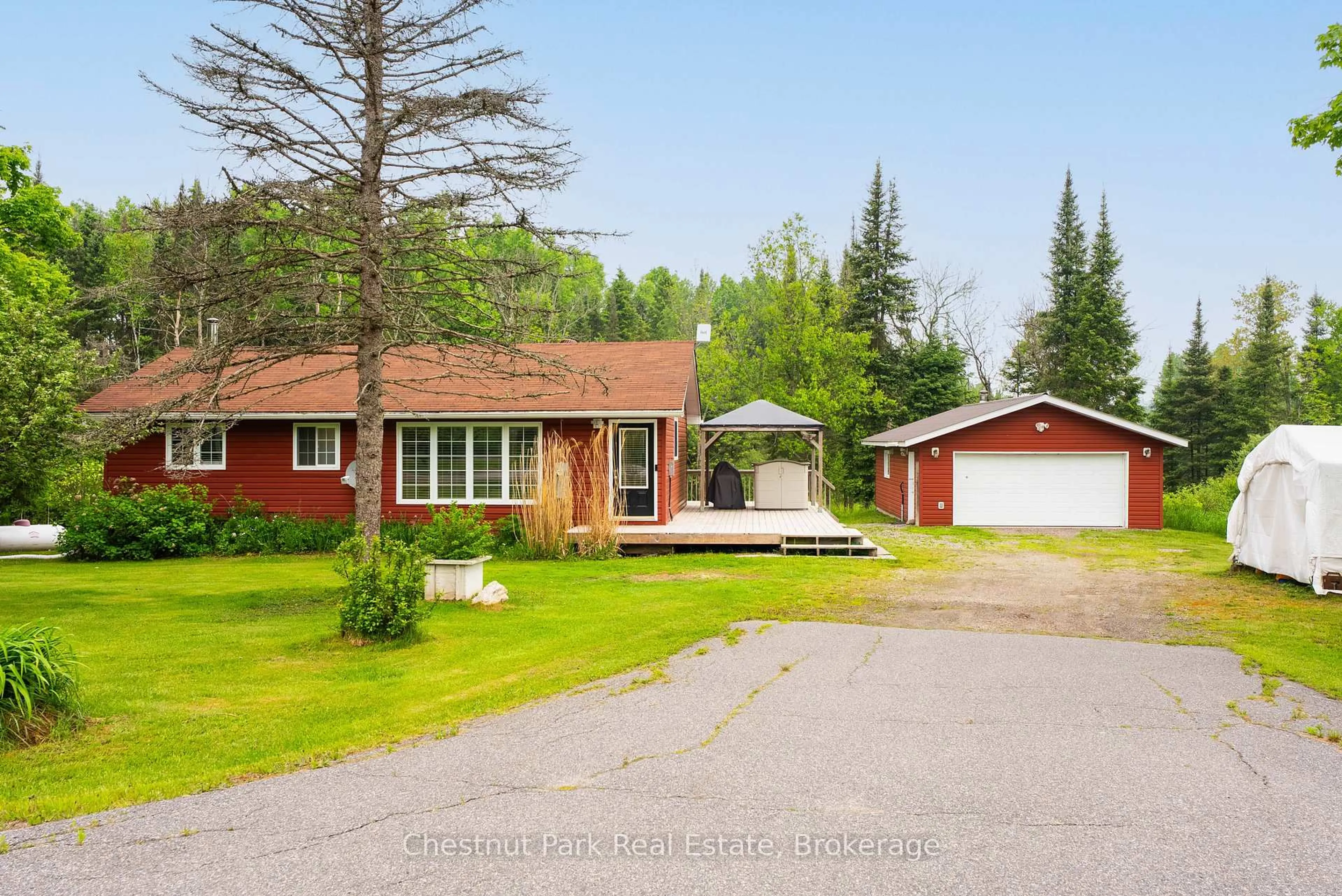 A pic from outside/outdoor area/front of a property/back of a property/a pic from drone, street for 1 Christopher Lane, Burk's Falls Ontario P0A 1C0