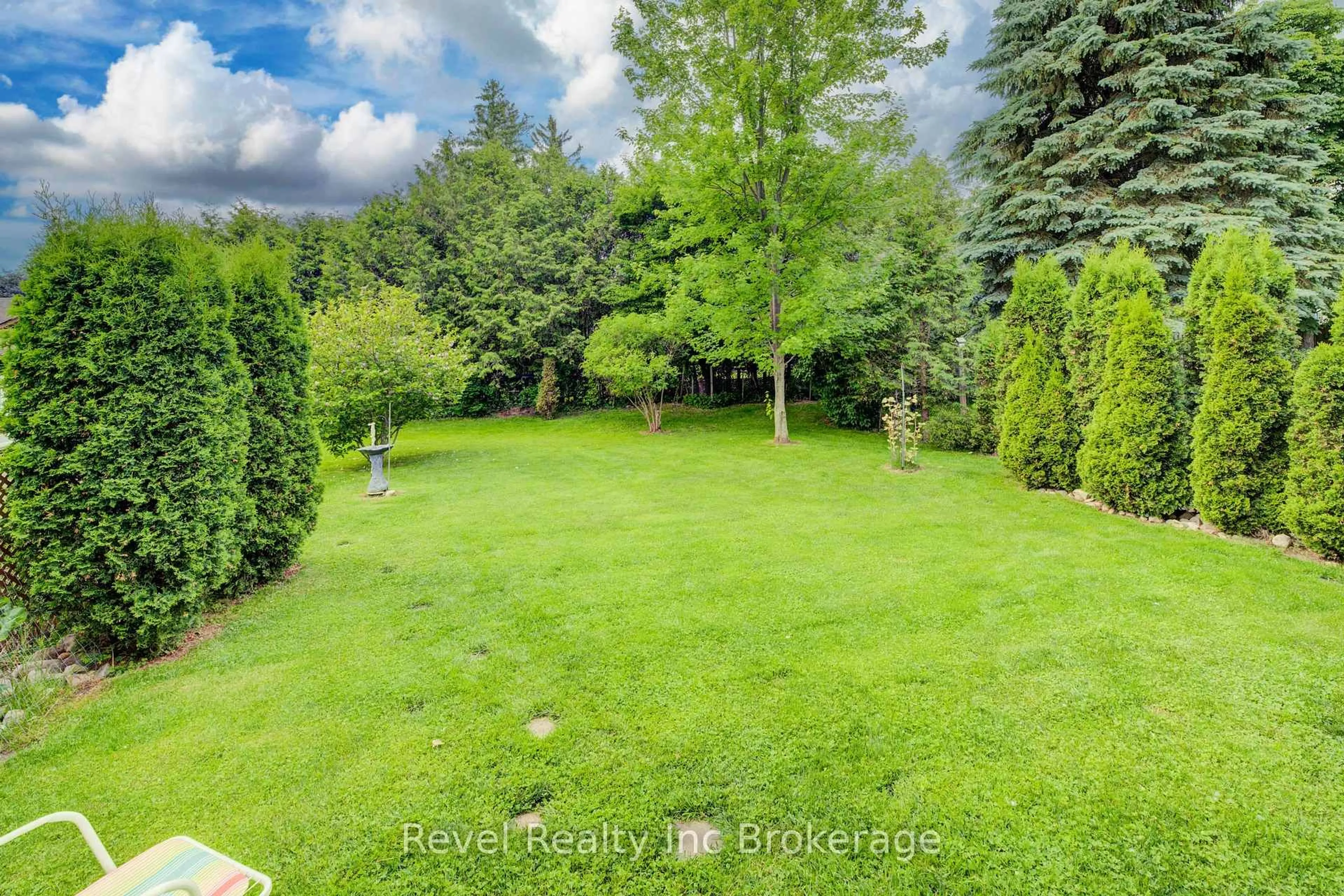 A pic from outside/outdoor area/front of a property/back of a property/a pic from drone, forest/trees view for 18 Cowan St, Blandford-Blenheim Ontario N0J 1V0