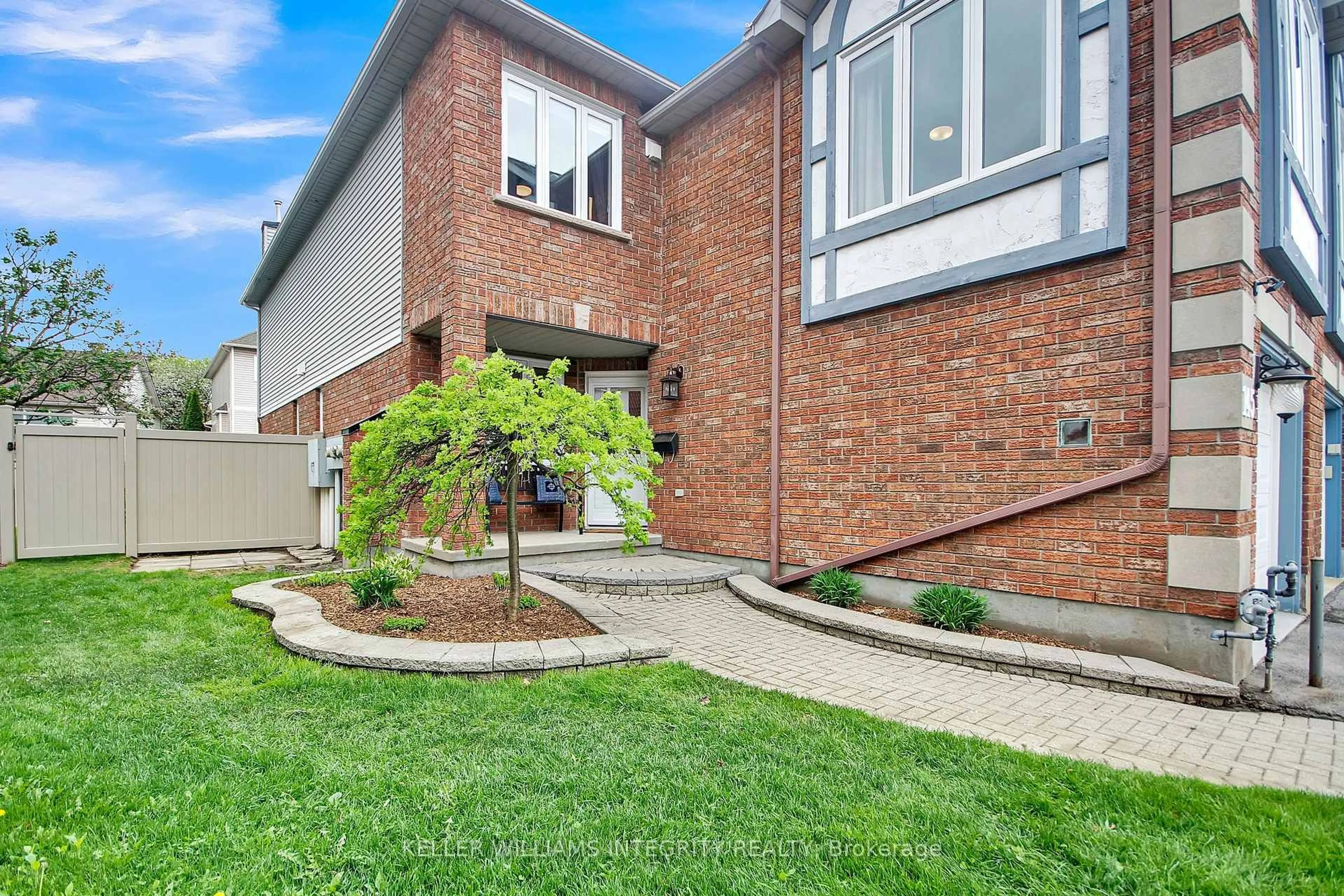 Home with brick exterior material, street for 145 Hunterswood Cres, Ottawa Ontario K1G 5W1