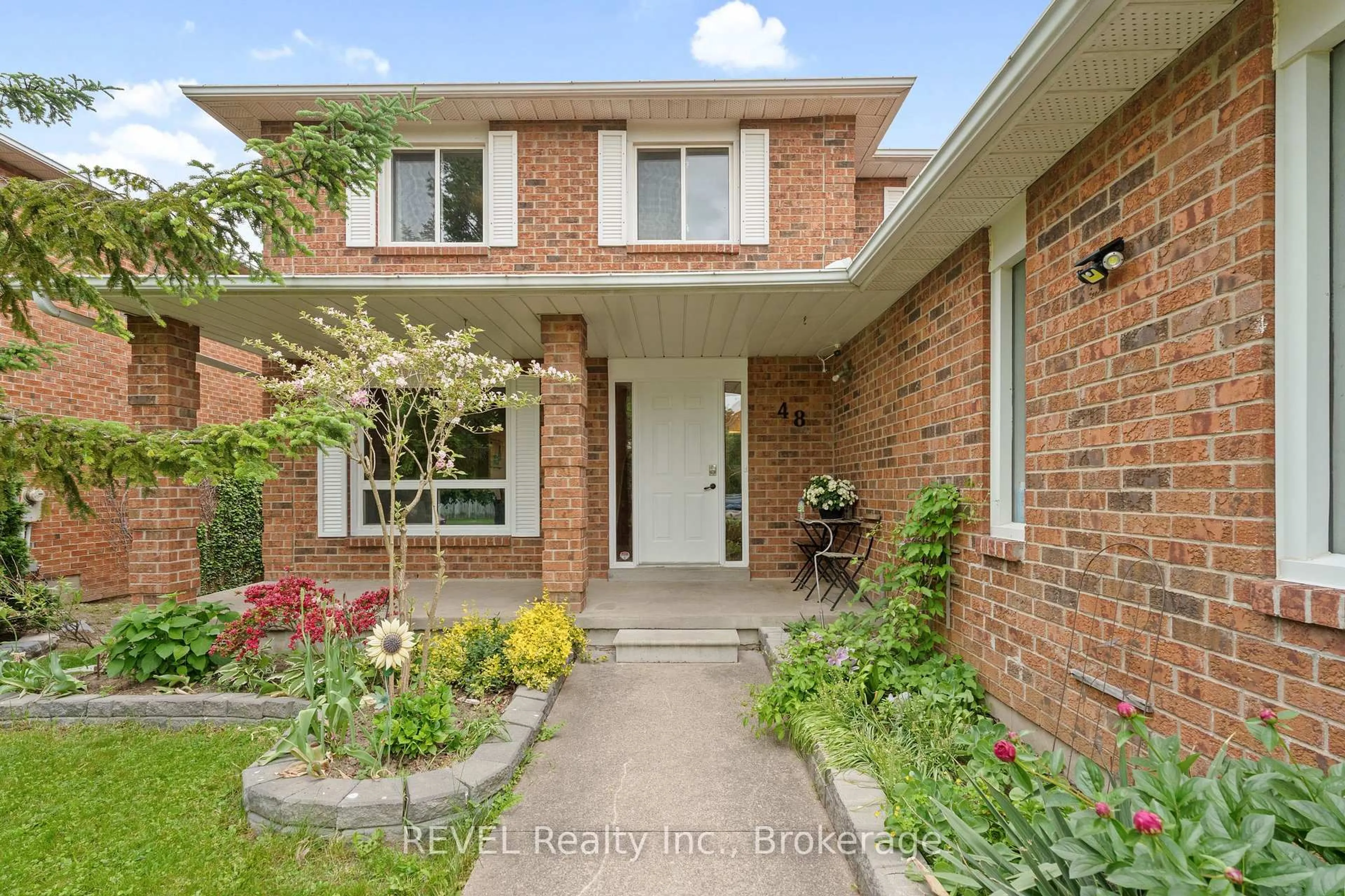 Home with brick exterior material, street for 48 Barbican Tr, St. Catharines Ontario L2T 4A3