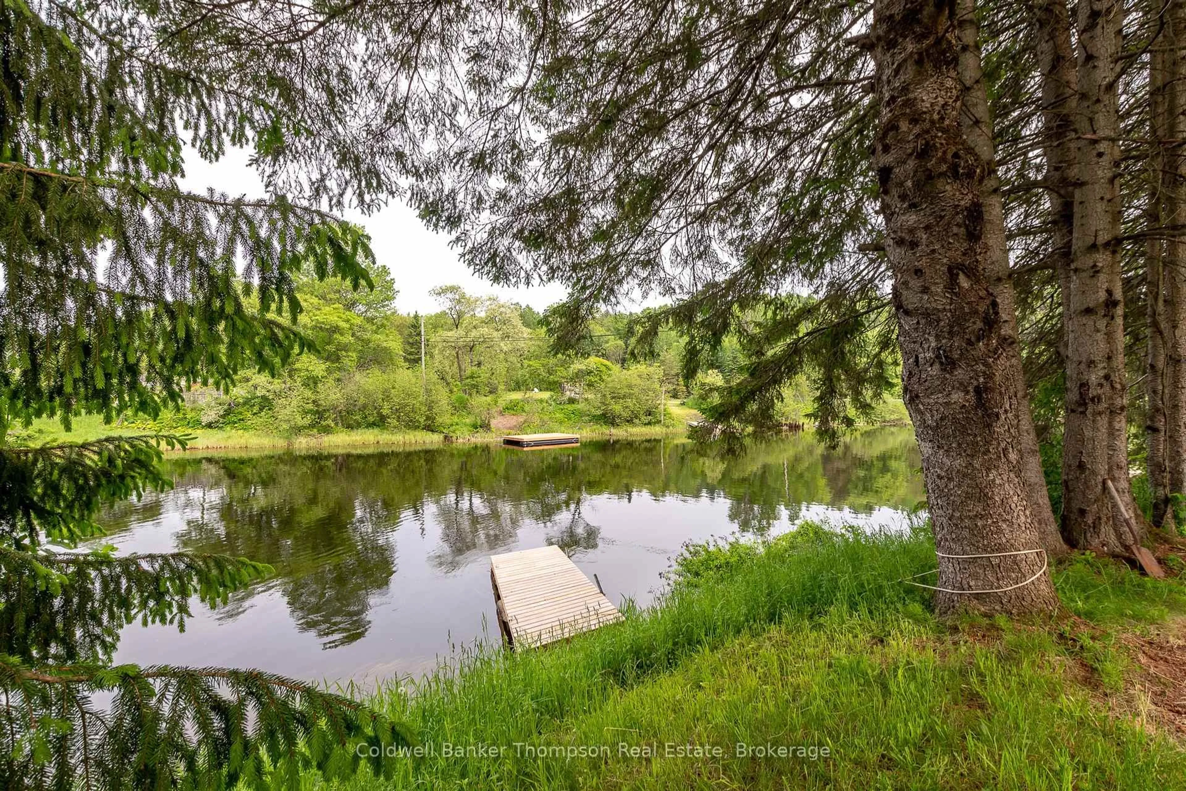 A pic from outside/outdoor area/front of a property/back of a property/a pic from drone, water/lake/river/ocean view for 112 Ryerson Cres, Burk's Falls Ontario P0A 1C0