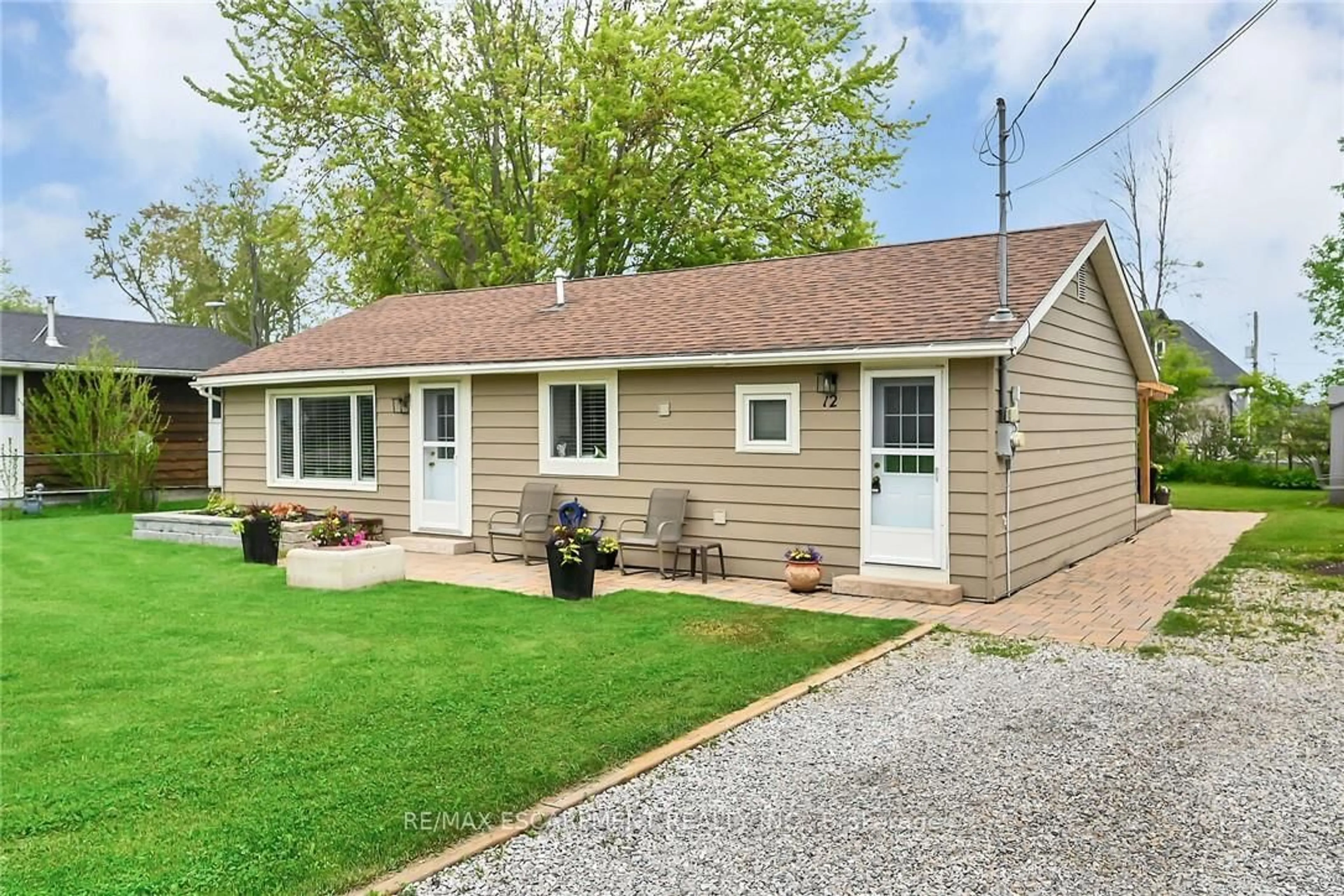 Home with vinyl exterior material, street for 12 Witherspoon Dr, Haldimand Ontario N0A 1L0