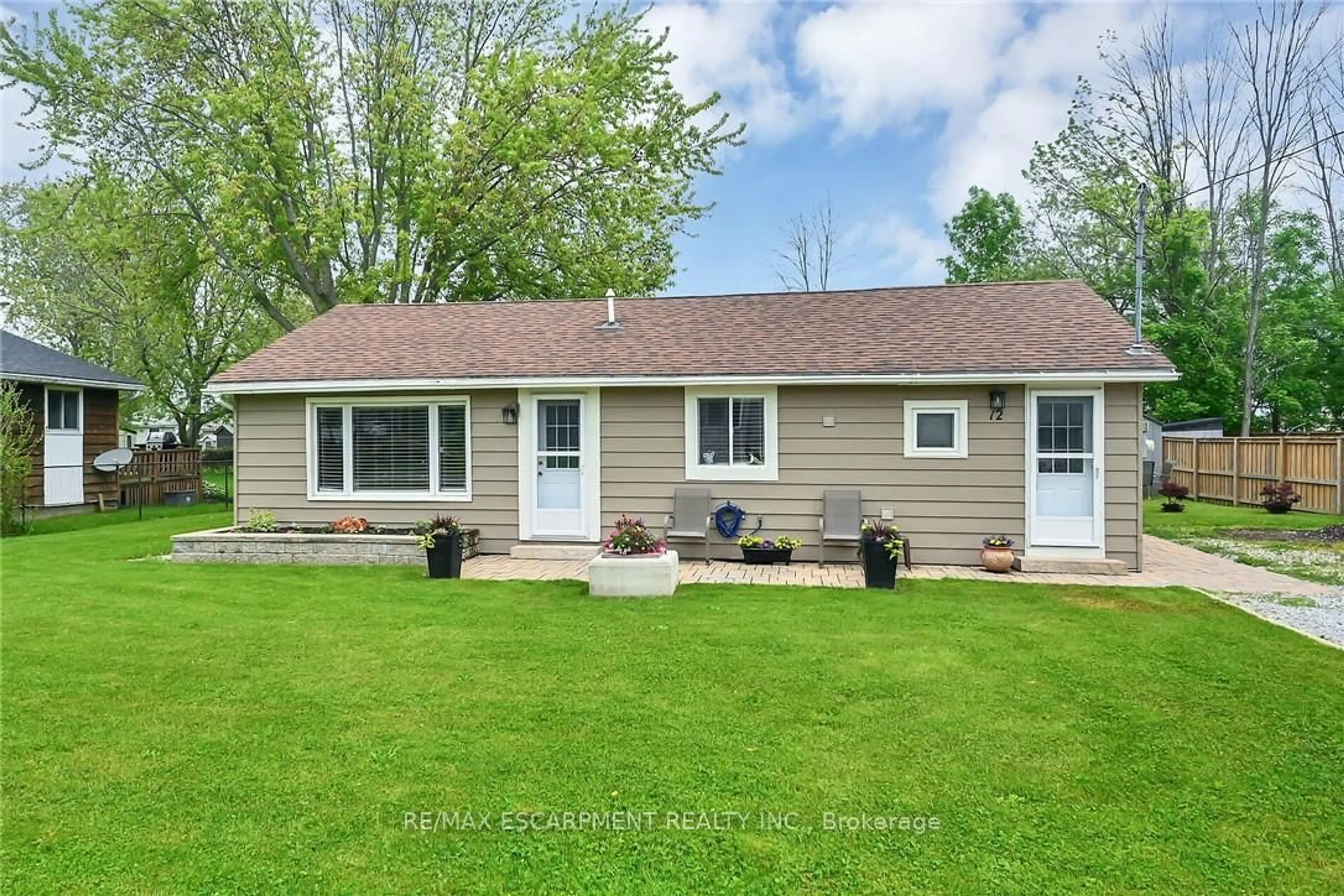 Home with vinyl exterior material, street for 12 Witherspoon Dr, Haldimand Ontario N0A 1L0