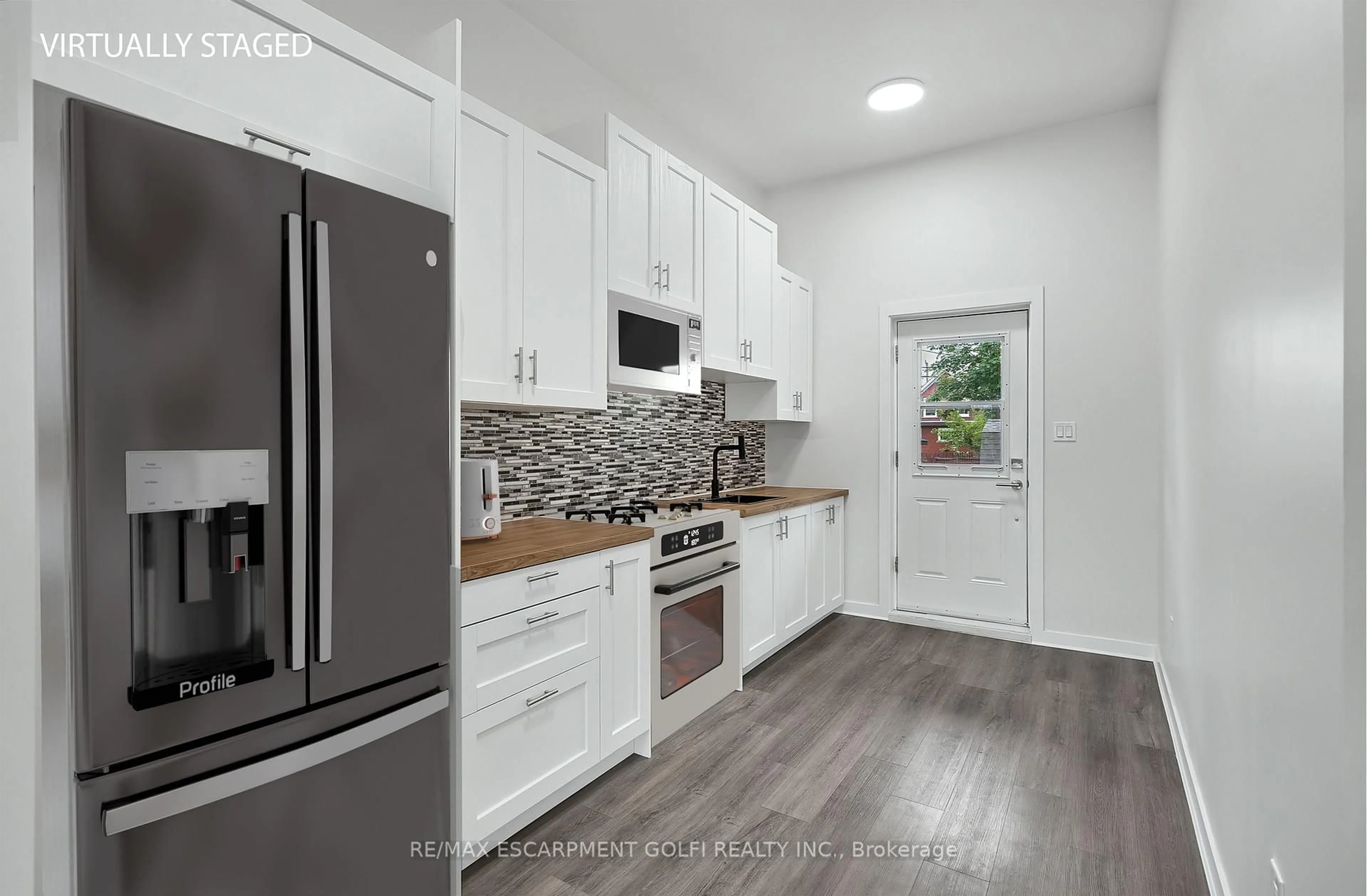 Open concept kitchen, unknown for 111 WELLINGTON St, Hamilton Ontario L8N 2R3