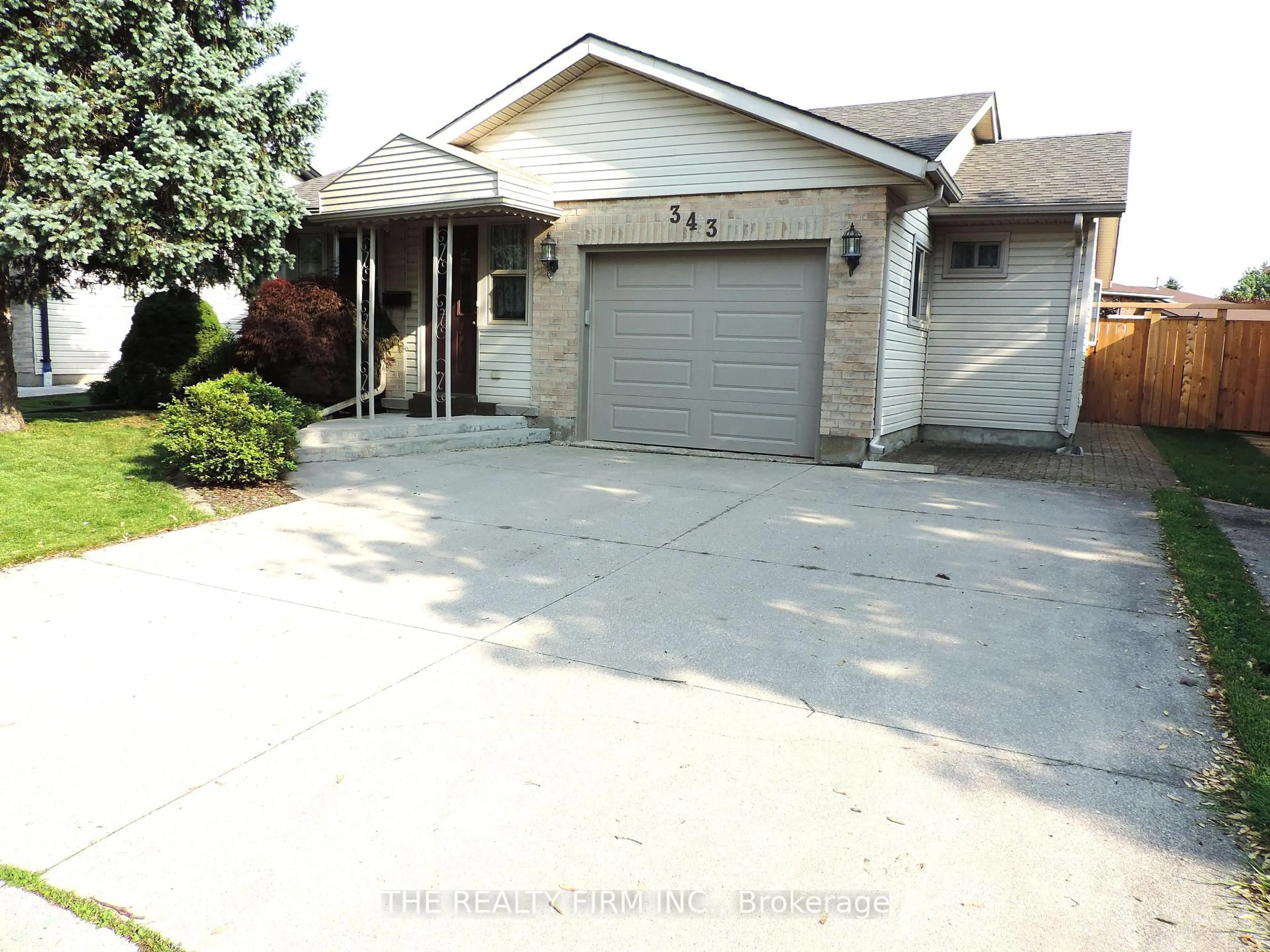 Home with vinyl exterior material, street for 343 Crawford St, London South Ontario N6C 5S3