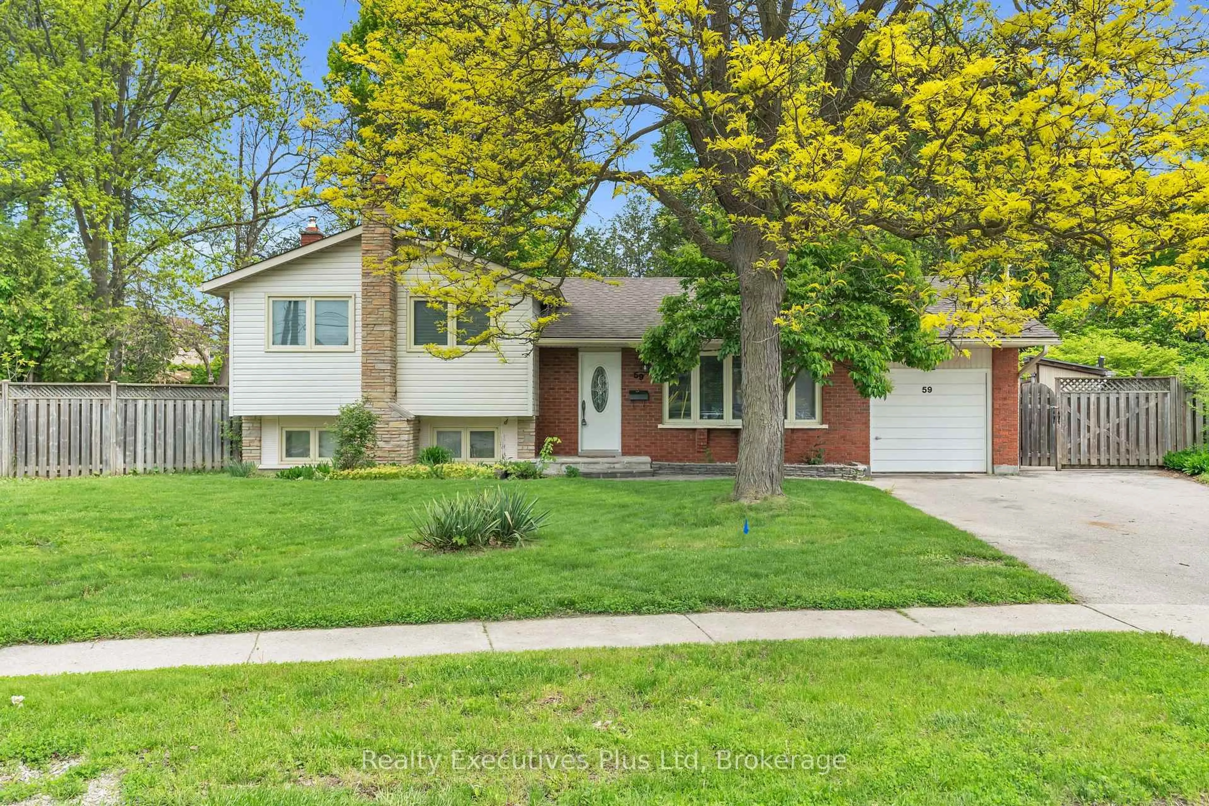 Home with vinyl exterior material, street for 59 Balmoral Dr, Guelph Ontario N1E 3N7