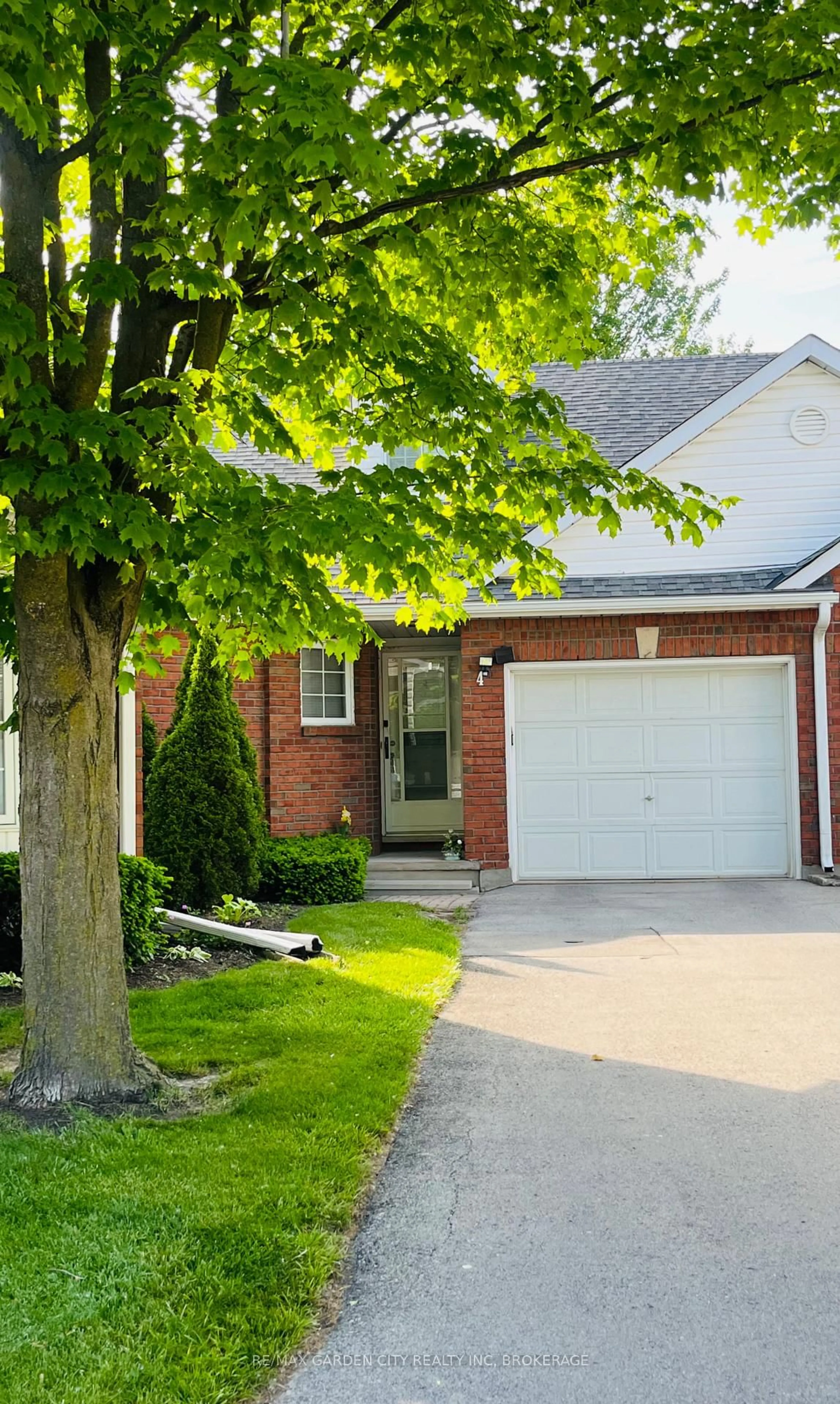 Home with brick exterior material, street for 7370 Monastery Dr #4, Niagara Falls Ontario L2H 3C4