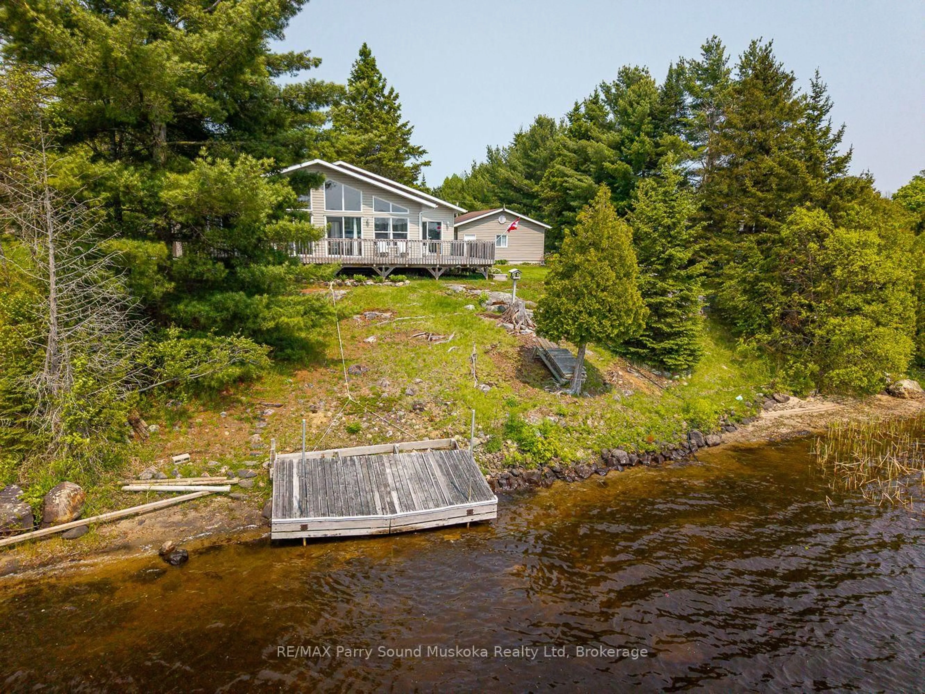 A pic from outside/outdoor area/front of a property/back of a property/a pic from drone, water/lake/river/ocean view for 9 Nickles Cove Rd, Whitestone Ontario P0A 1G0