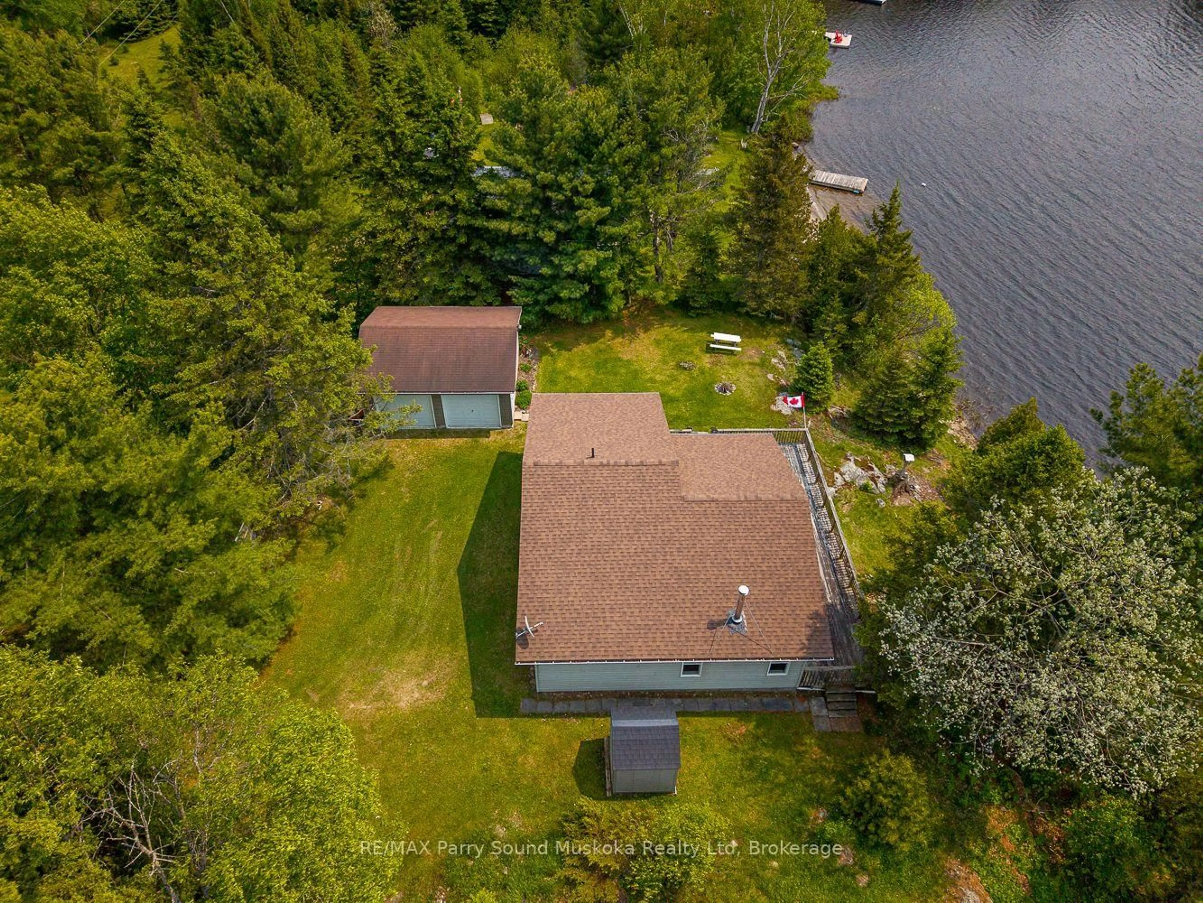A pic from outside/outdoor area/front of a property/back of a property/a pic from drone, water/lake/river/ocean view for 9 Nickles Cove Rd, Whitestone Ontario P0A 1G0